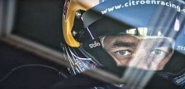 Loeb vence bateria interrompida pela chuva