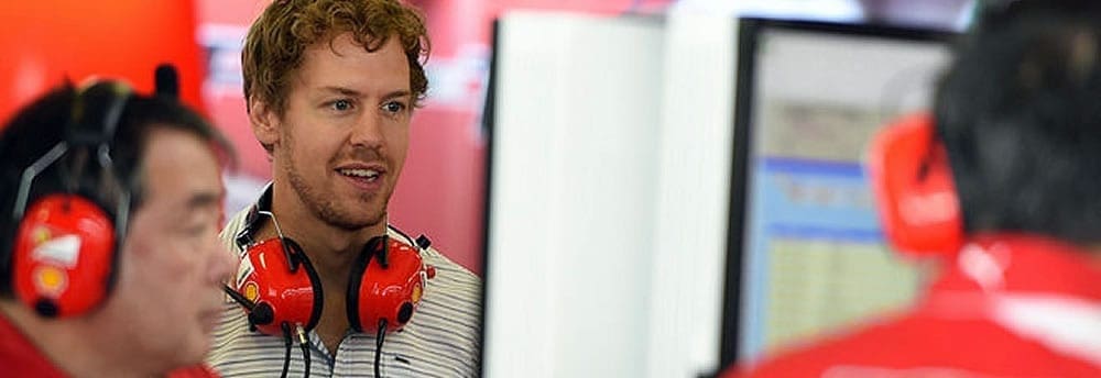 Vettel acompanha testes dos boxes da Ferrari