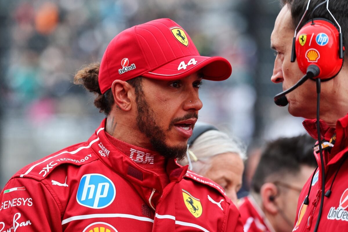(L to R): Lewis Hamilton (GBR) Ferrari with Riccardo Adami (ITA) Ferrari Race Engineer on the grid.