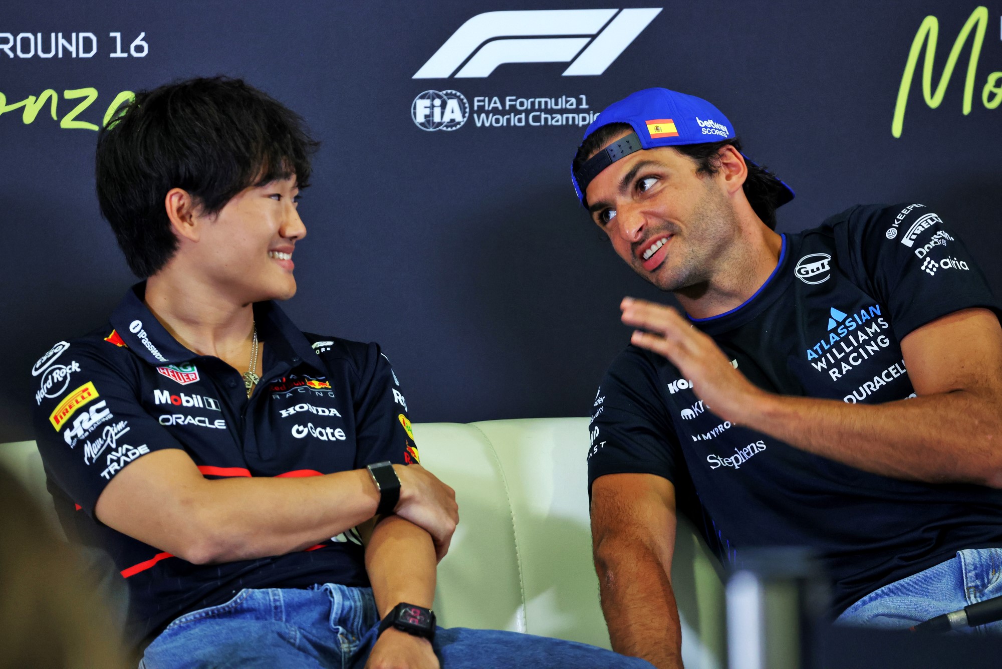 (L to R): Yuki Tsunoda (JPN) Red Bull Racing and Carlos Sainz (ESP) Atlassian Williams Racing in the FIA Press Conference.