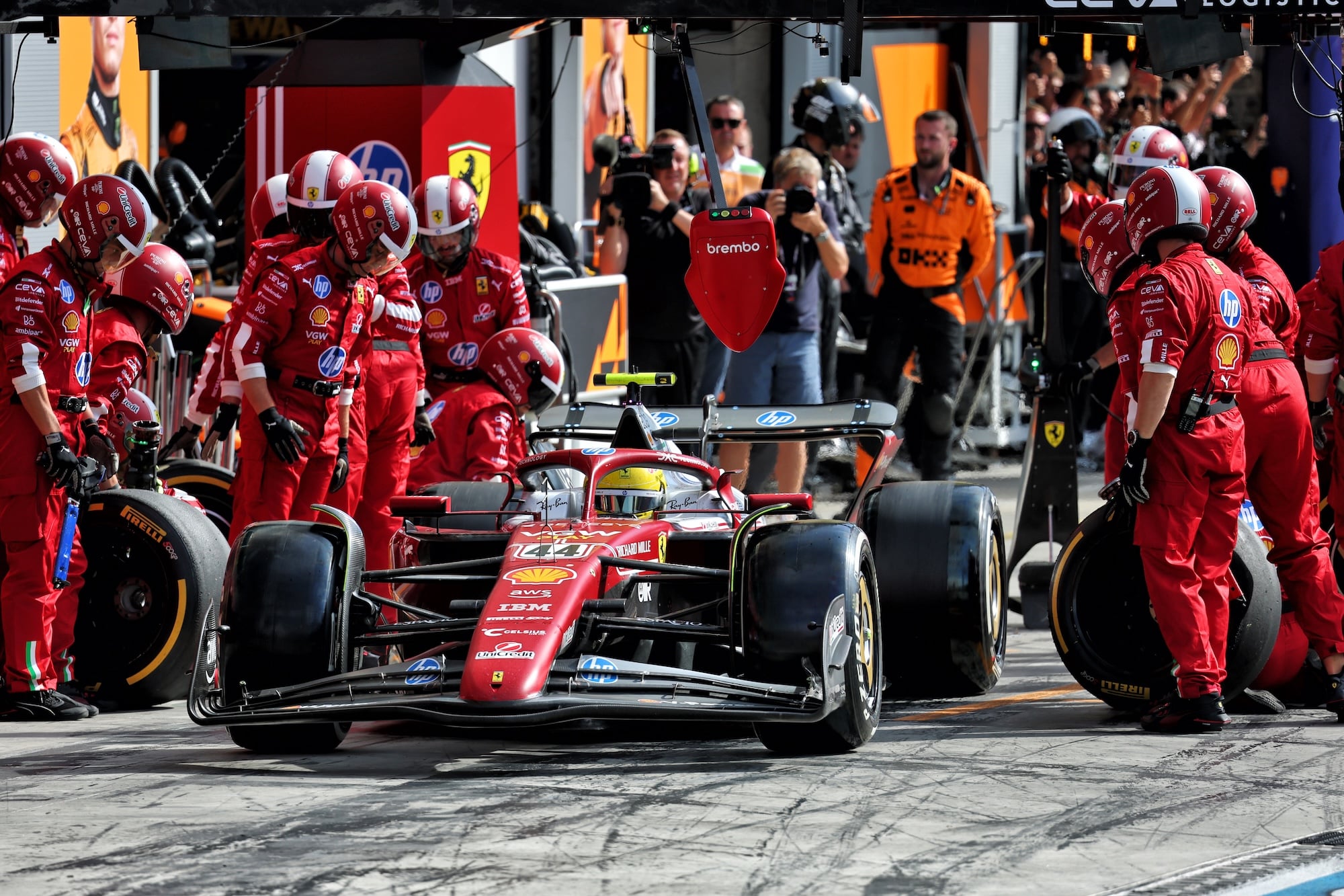 Lewis Hamilton (GBR) Ferrari SF-25 makes a pit stop.