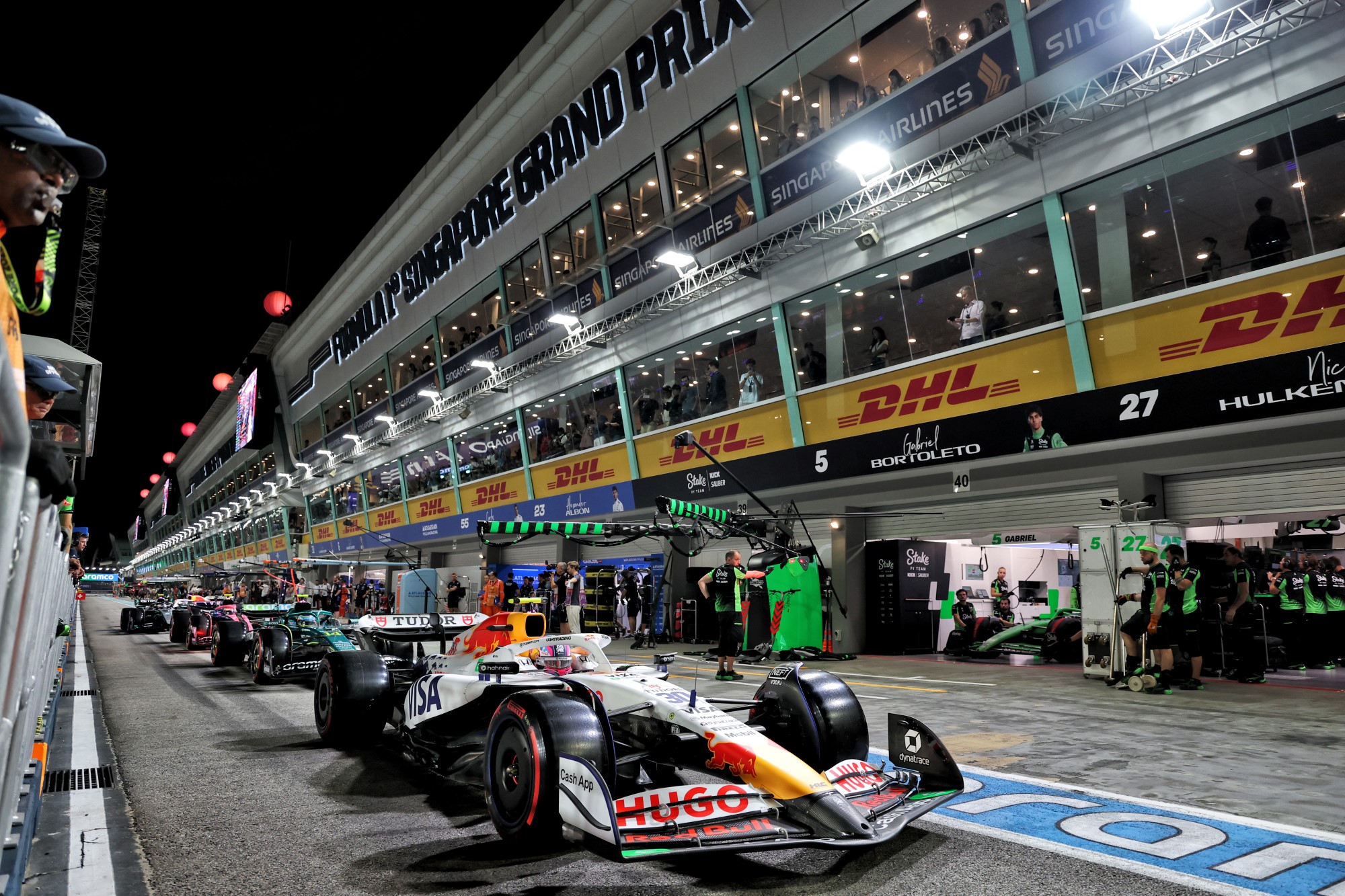 Liam Lawson (NZL) Racing Bulls VCARB 02 in the pits.