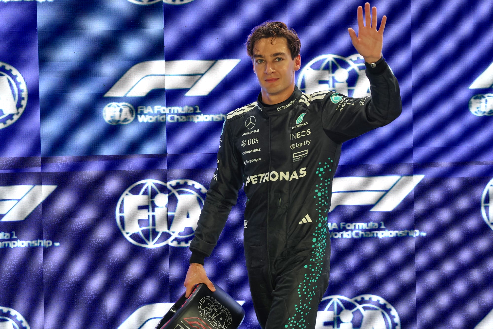 George Russell (GBR) Mercedes AMG F1 celebrates his pole position in qualifying parc ferme.