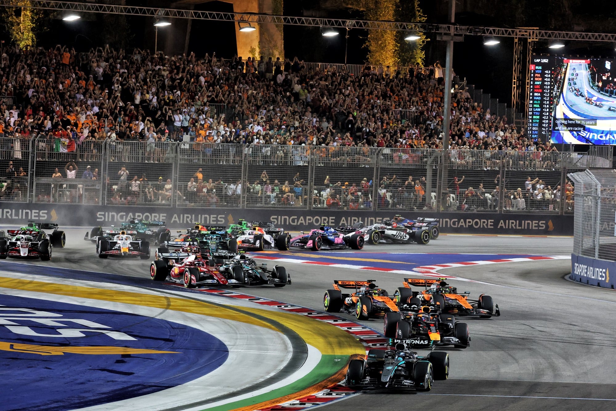 George Russell (GBR) Mercedes AMG F1 W16 leads at the start of the race.
