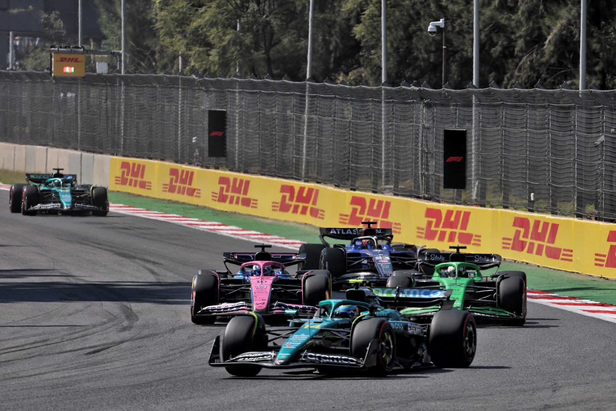 Pierre Gasly (FRA) Alpine F1 Team A525 and Nico Hulkenberg (GER) Sauber C45 battle for position behind Fernando Alonso (ESP) Aston Martin F1 Team AMR25.