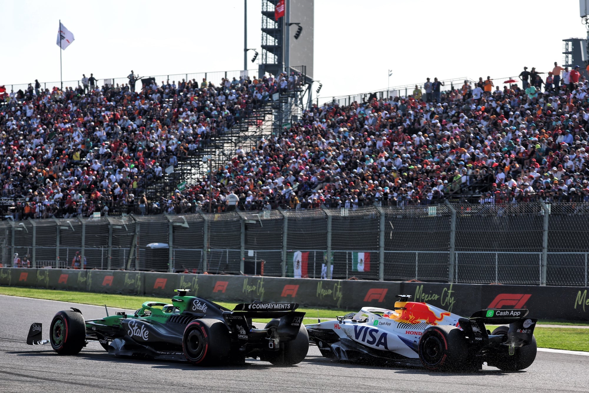 Isack Hadjar (FRA) Racing Bulls VCARB 02 and Gabriel Bortoleto (BRA) Sauber C45 battle for position.