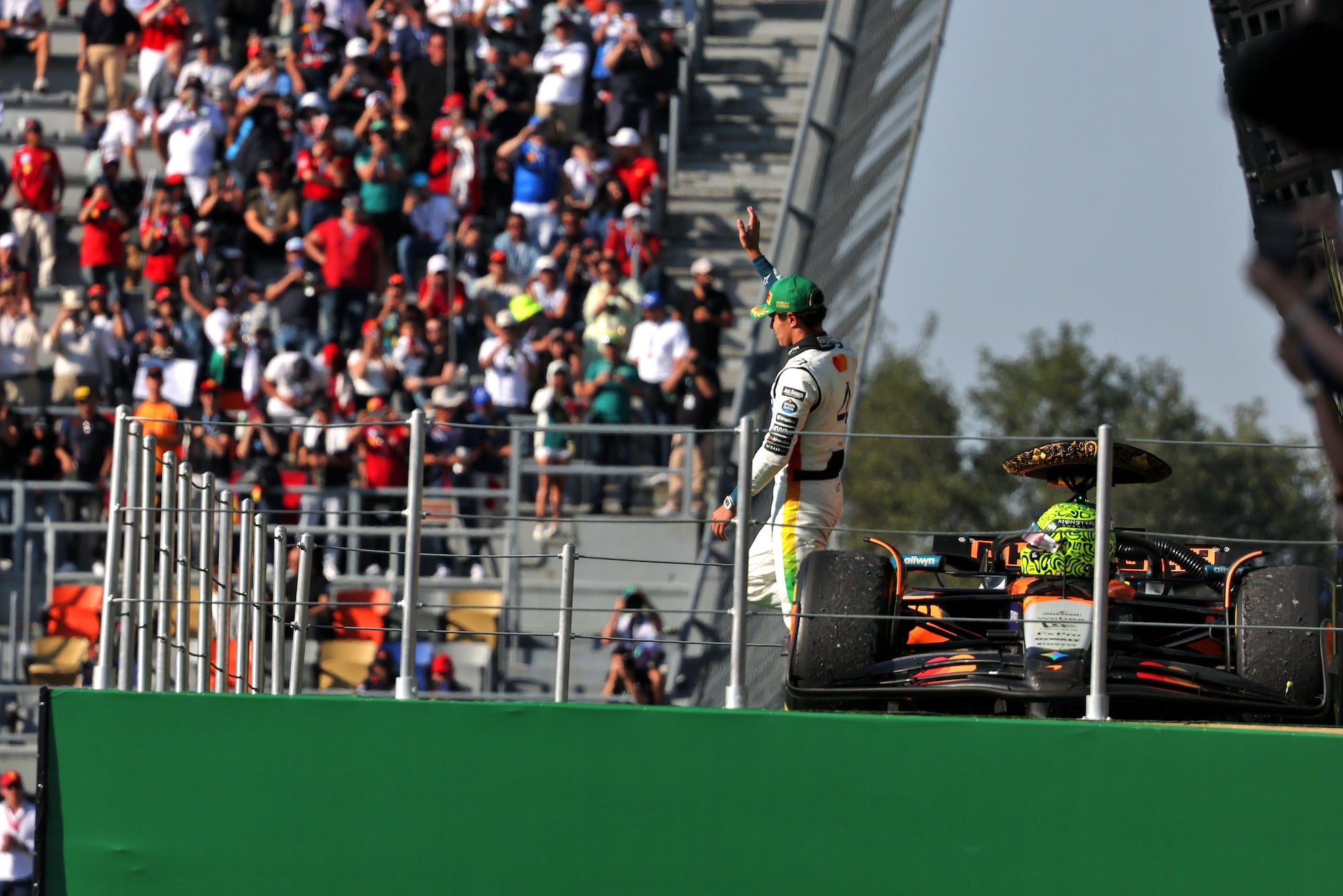 Race winner Lando Norris (GBR) McLaren MCL39 celebrates on the podium.
