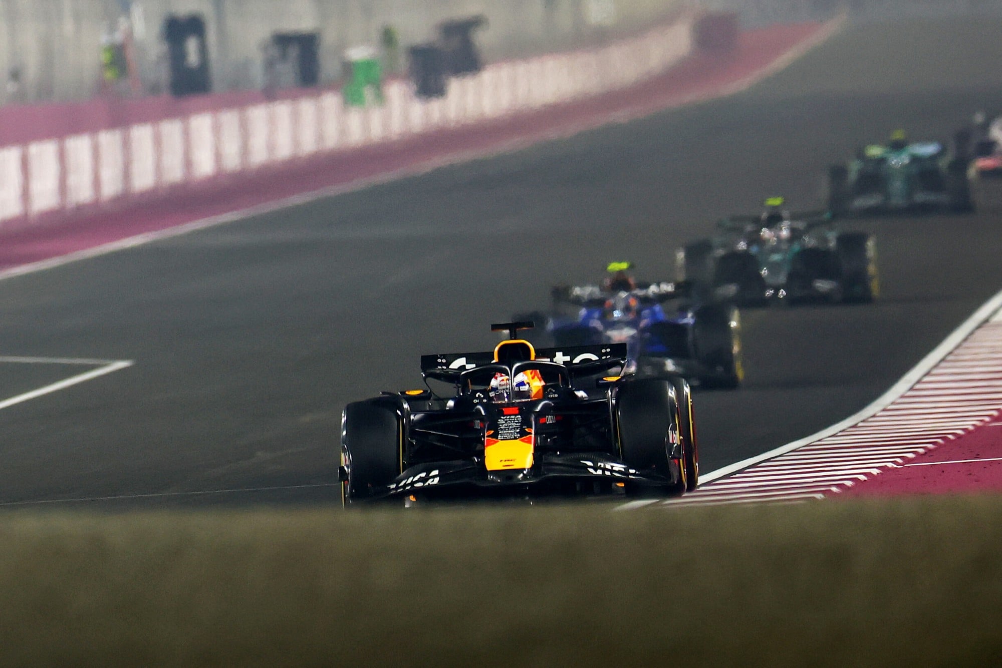 LUSAIL CITY, QATAR - NOVEMBER 30: Max Verstappen of the Netherlands driving the (1) Oracle Red Bull Racing RB21 on track during the F1 Grand Prix of Qatar at Lusail International Circuit on November 30, 2025 in Lusail City, Qatar. (Photo by Mark Thompson/Getty Images) // Getty Images / Red Bull Content Pool // SI202511300467 // Usage for editorial use only //