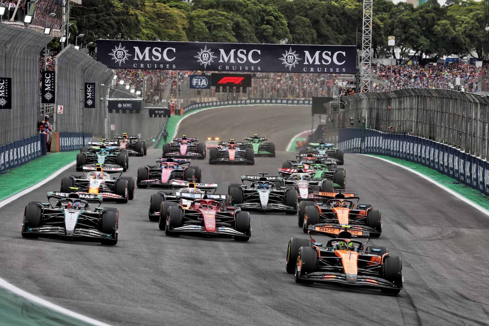 Lando Norris (GBR) McLaren MCL39 leads at the start of the race.
