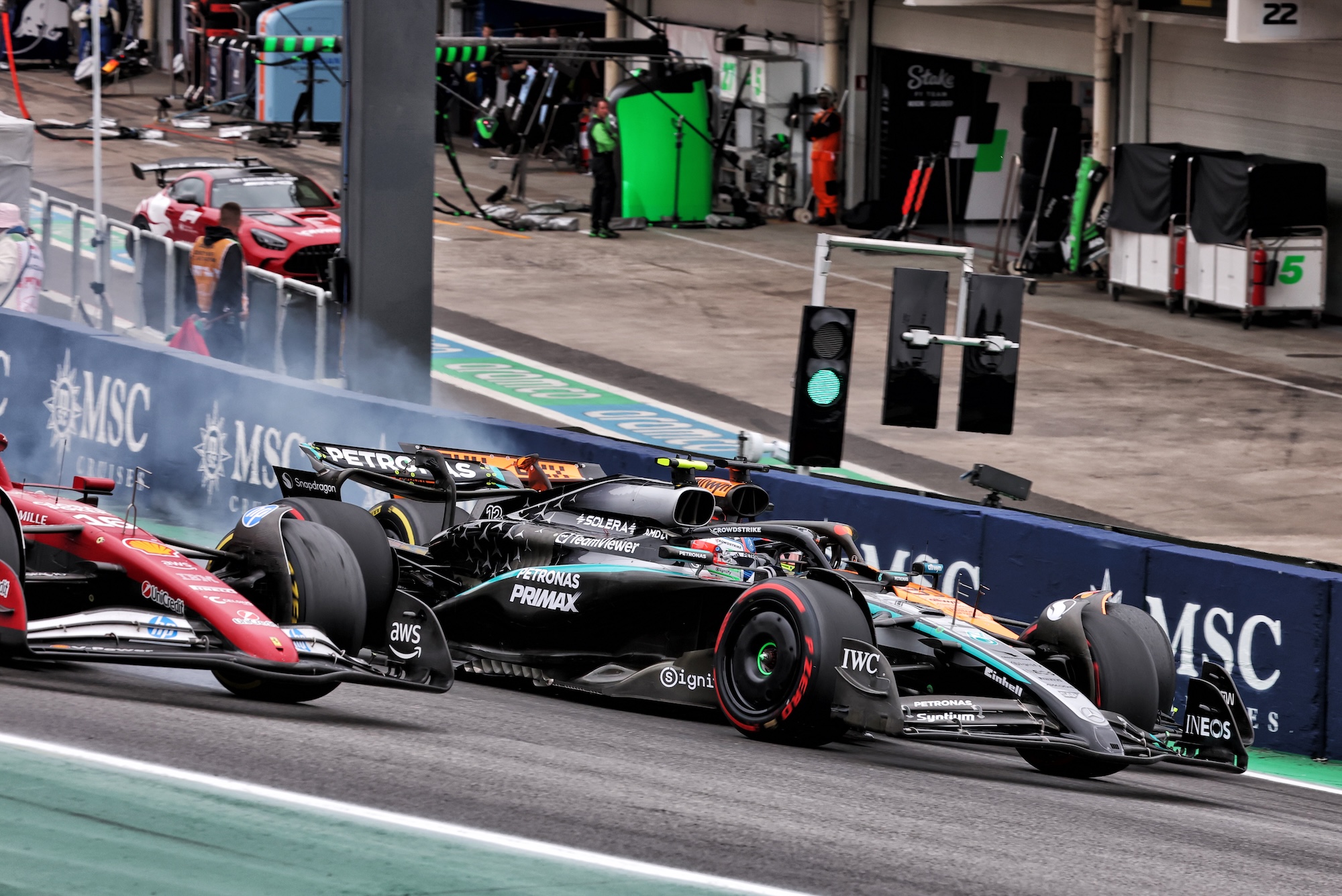 Charles Leclerc (MON) Ferrari SF-25; Andrea Kimi Antonelli (ITA) Mercedes AMG F1 W16; and Oscar Piastri (AUS) McLaren MCL39, who made contact at turn 1.