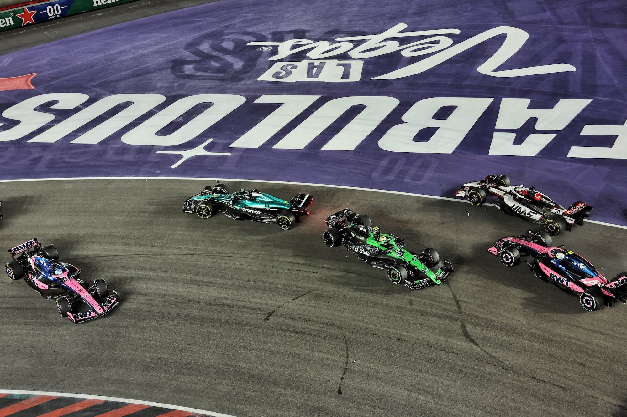 Lance Stroll (CDN) Aston Martin F1 Team AMR25 and Gabriel Bortoleto (BRA) Sauber C45 make contact at the start of the race behind Pierre Gasly (FRA) Alpine F1 Team A525.