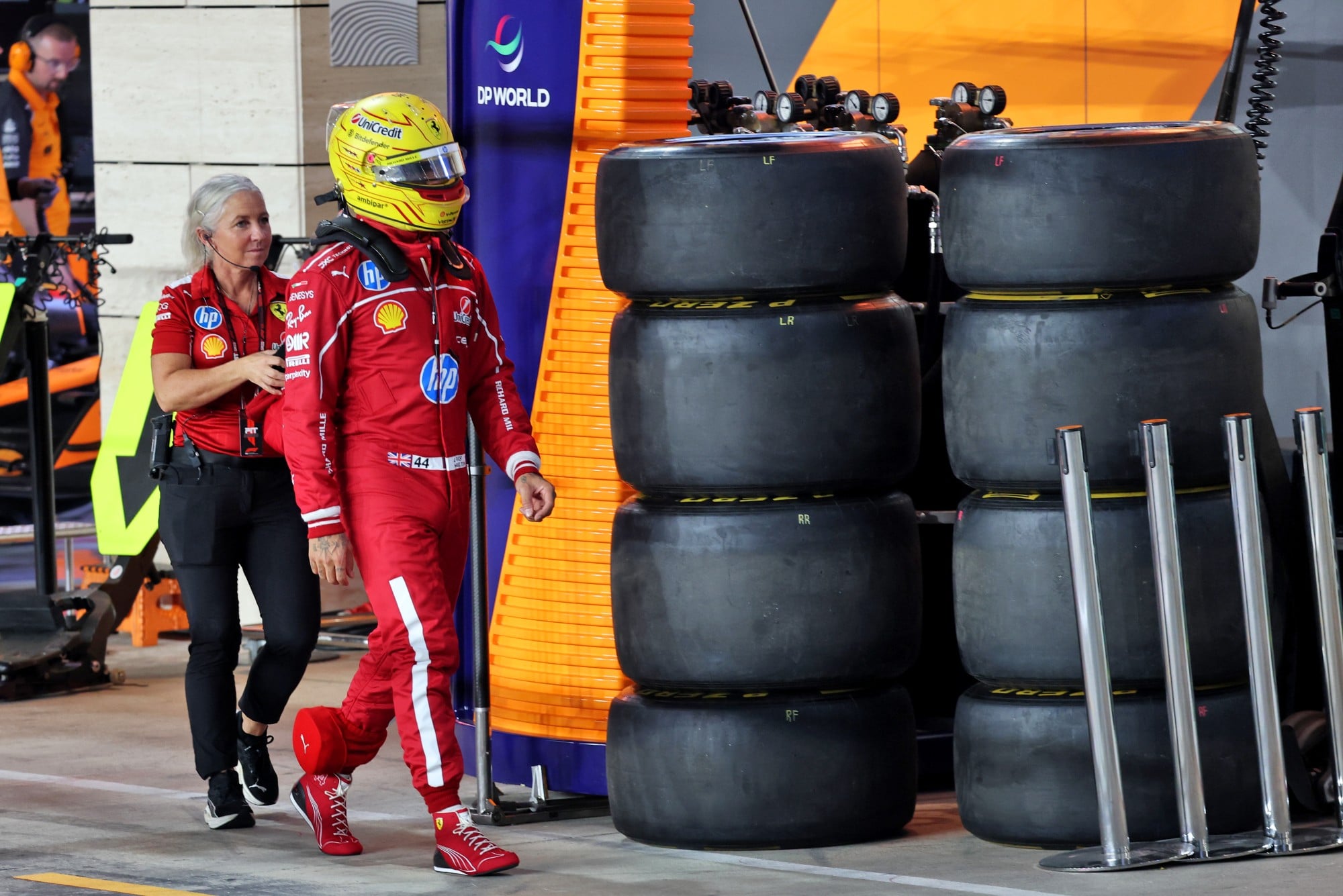 Lewis Hamilton (GBR) Ferrari with Angela Cullen (NZL) Ferrari Physiotherapist.