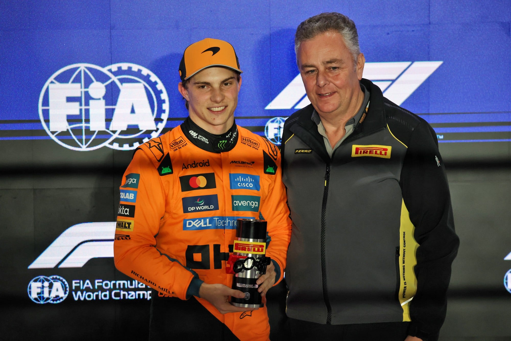 (L to R): Oscar Piastri (AUS) McLaren receives the Pirelli Pole Position Award from Mario Isola (ITA) Pirelli Racing Manager in Sprint qualifying parc ferme.