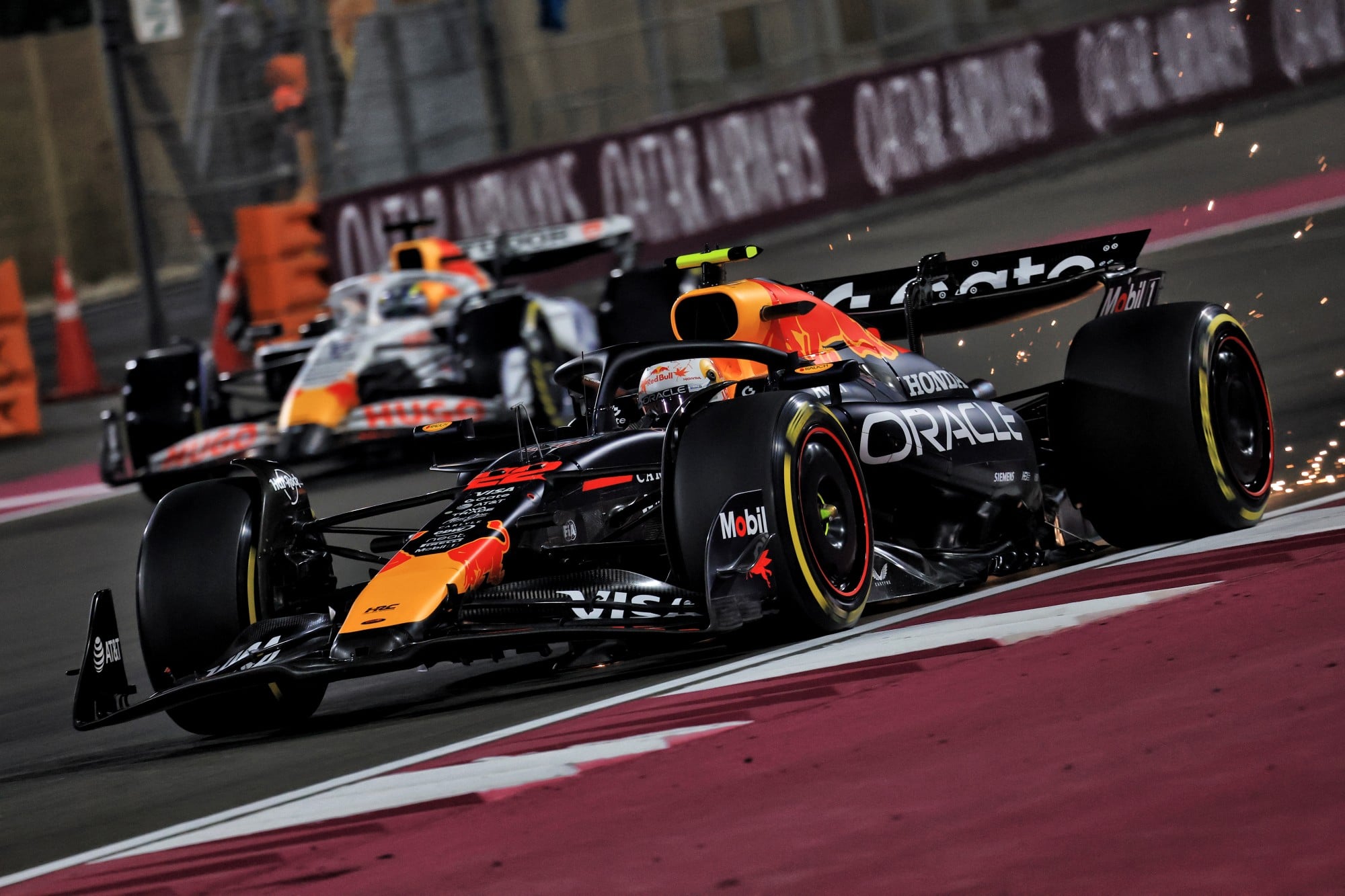 Yuki Tsunoda (JPN) Red Bull Racing RB21 and Isack Hadjar (FRA) Racing Bulls VCARB 02.