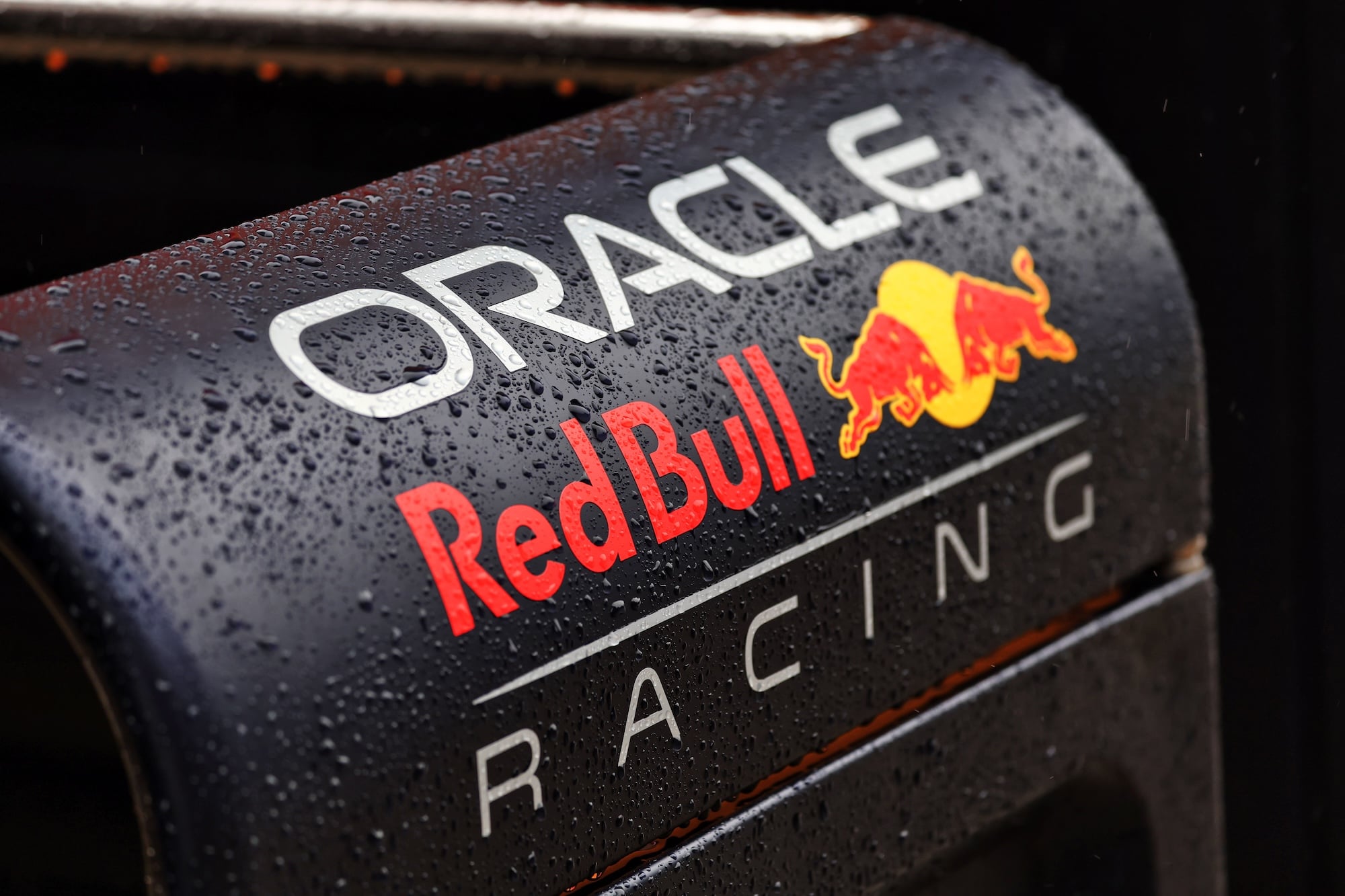 Red Bull Racing logo with rain drops.