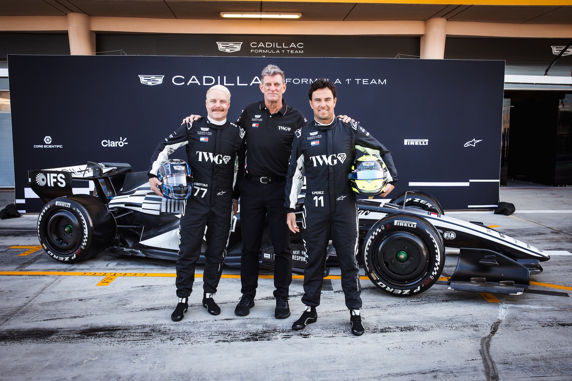 (L to R): Valtteri Bottas (FIN) Cadillac Formula 1 Team with Graeme Lowdon (GBR) Cadillac Formula 1 Team, Team Principal and Sergio Perez (MEX) Cadillac Formula 1 Team. 11.02.2026. Formula 1 Testing, Bahrain Test One, Sakhir, Bahrain, Day One.