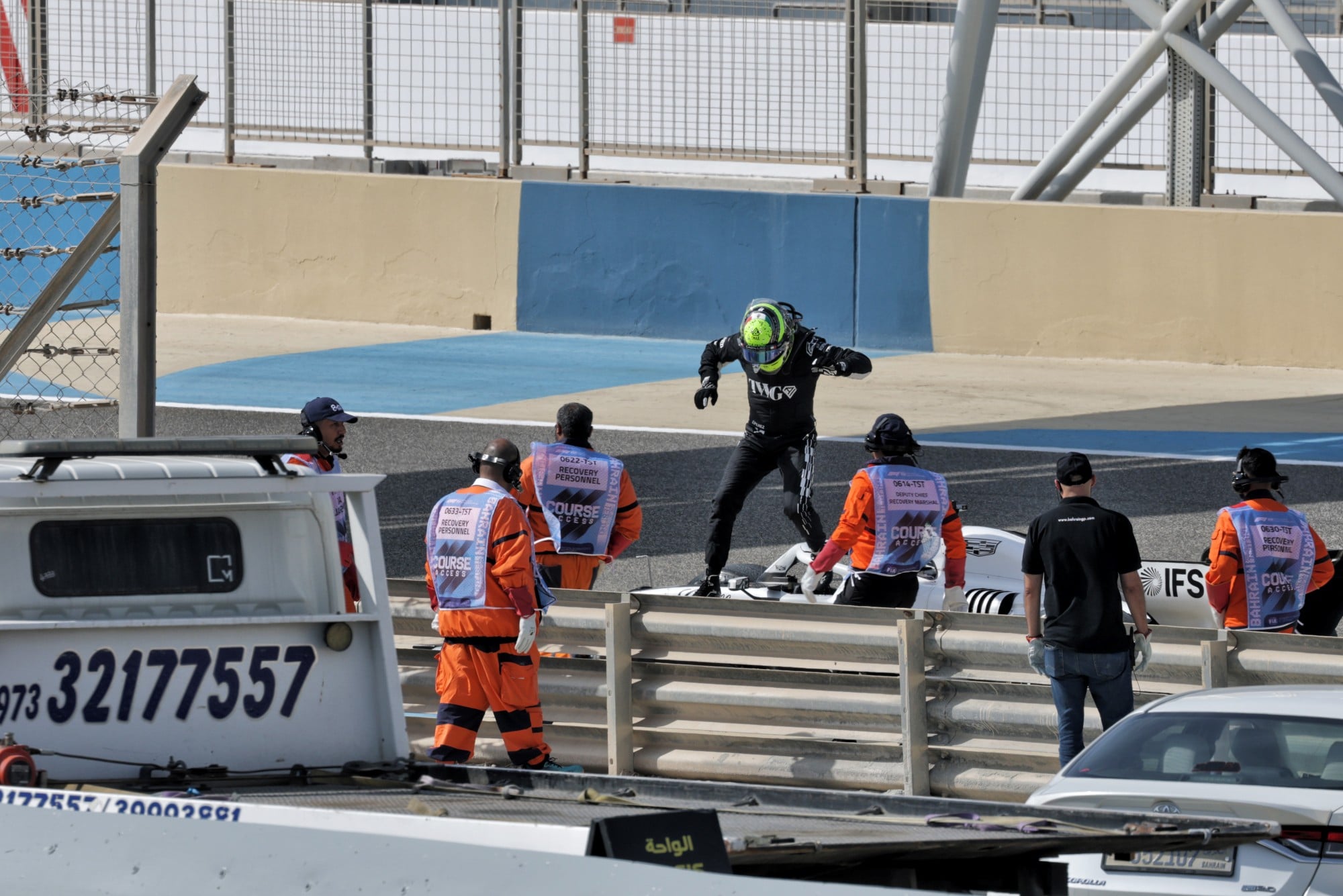 Sergio Perez (MEX) Cadillac Formula 1 Team Car stopped on the circuit.