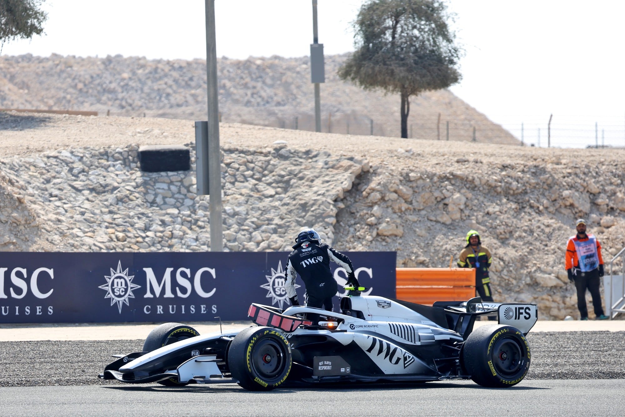 Valtteri Bottas (FIN) Cadillac Formula 1 Team stopped on the circuit.