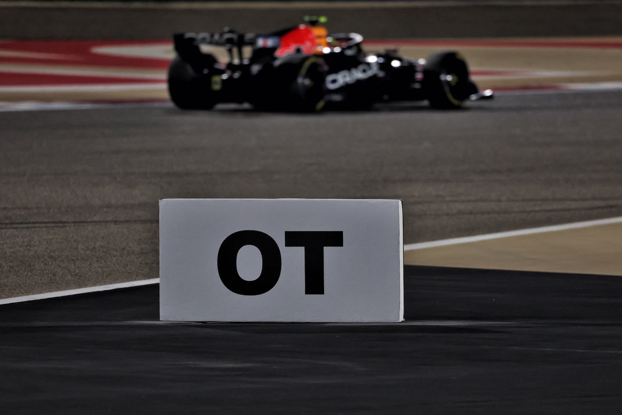 Isack Hadjar (FRA) Red Bull Racing RB22 passes an Overtake detection / activation zone sign trackside.