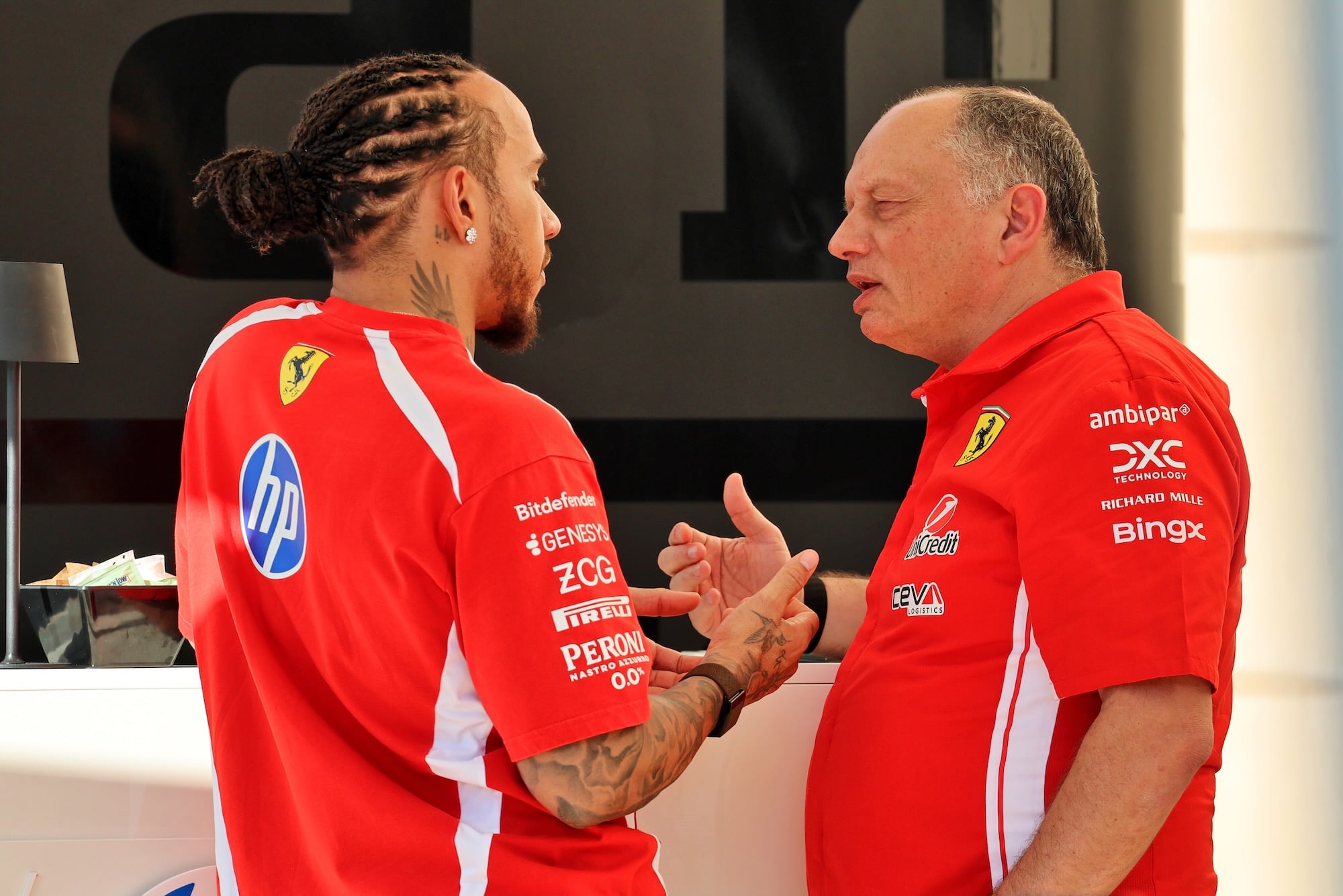 (L to R): Lewis Hamilton (GBR) Scuderia Ferrari with Frederic Vasseur (FRA) Scuderia Ferrari Team Principal.