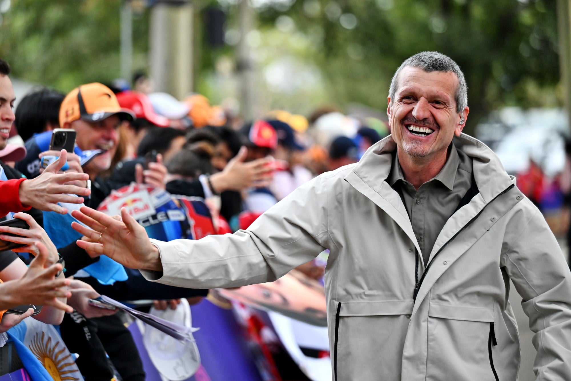 Guenther Steiner (ITA) with fans.
