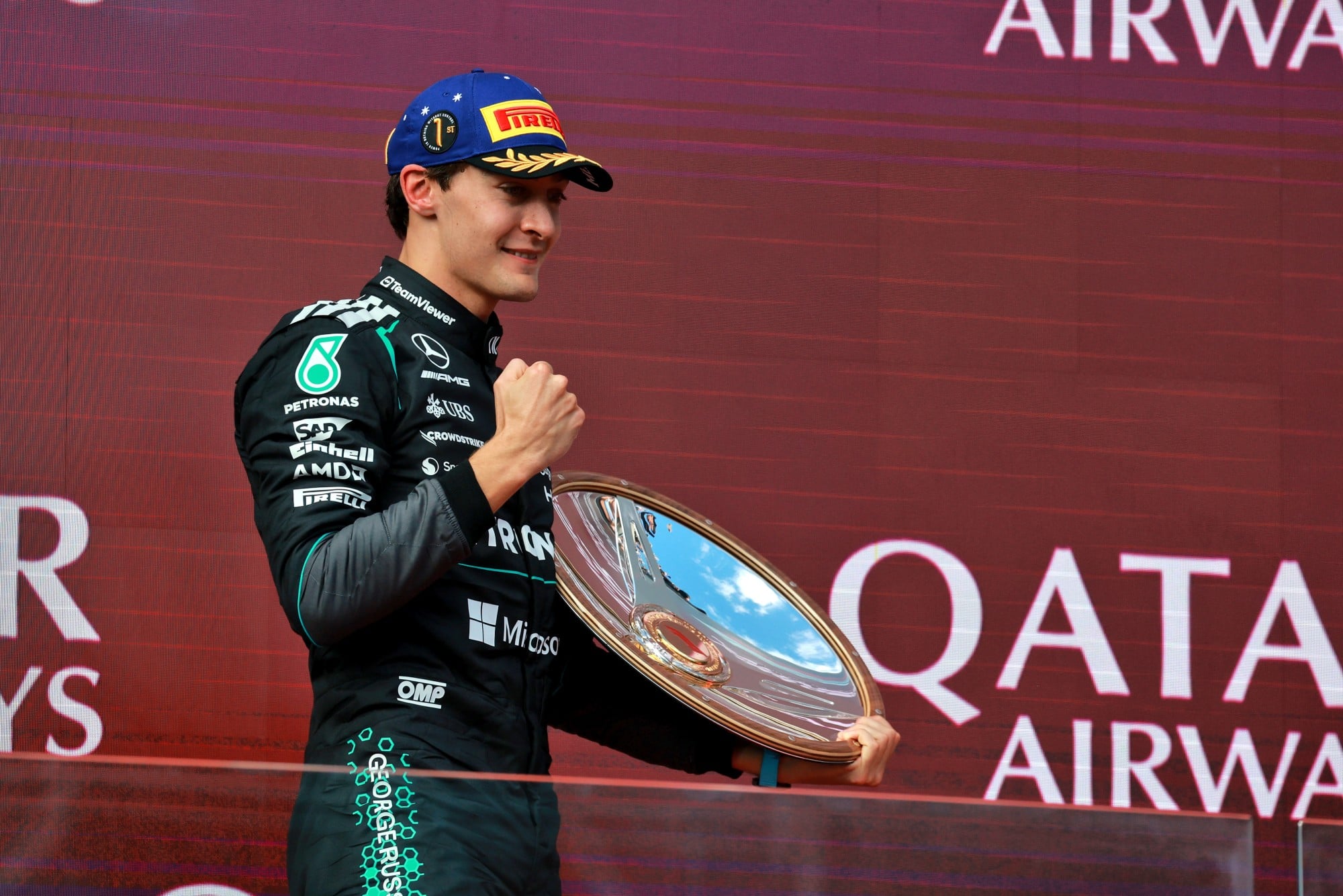 Race winner George Russell (GBR) Mercedes AMG Formula One Team celebrates on the podium.