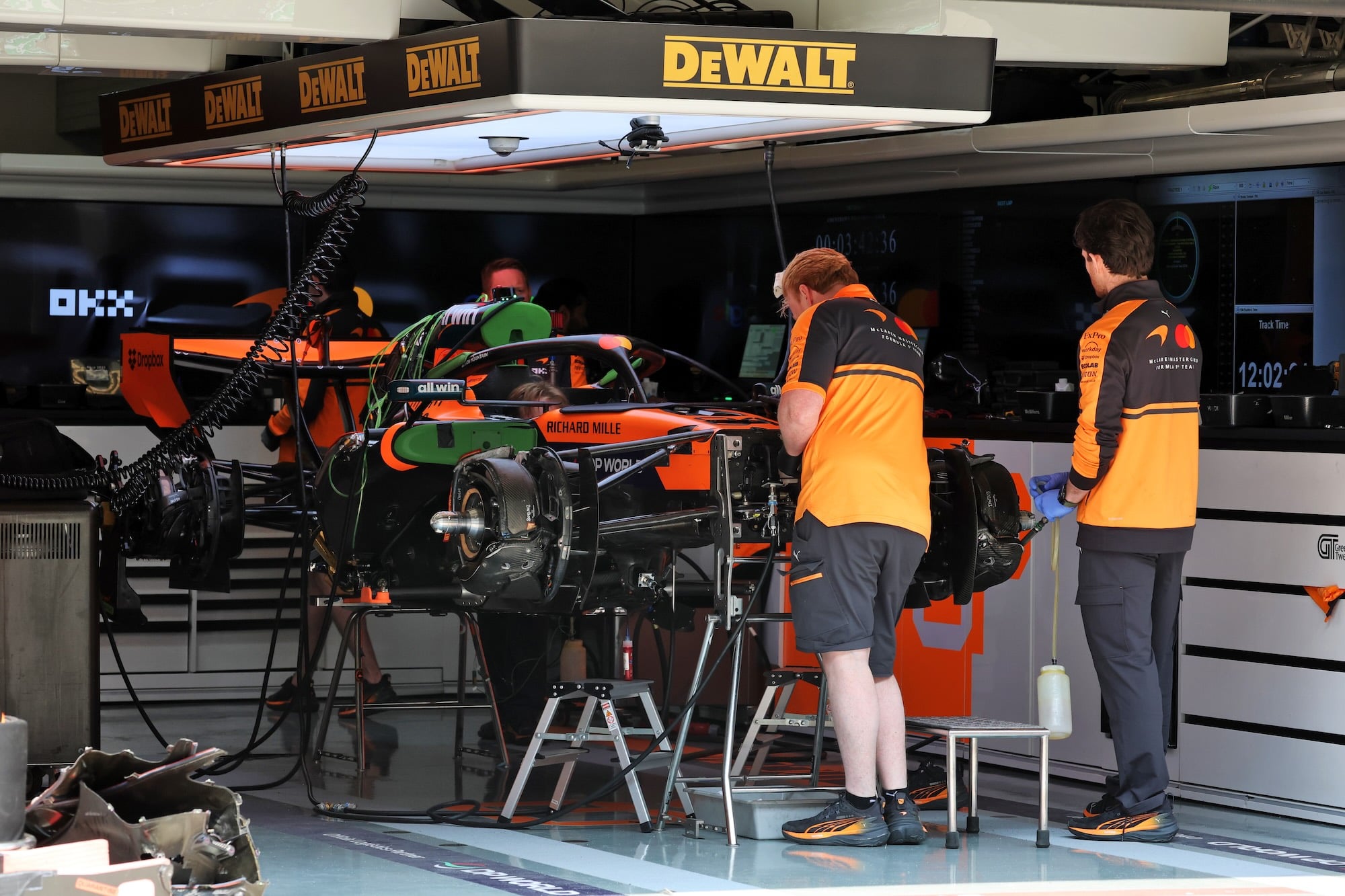 McLaren F1 Team MCL40 being prepared in the pit garage.