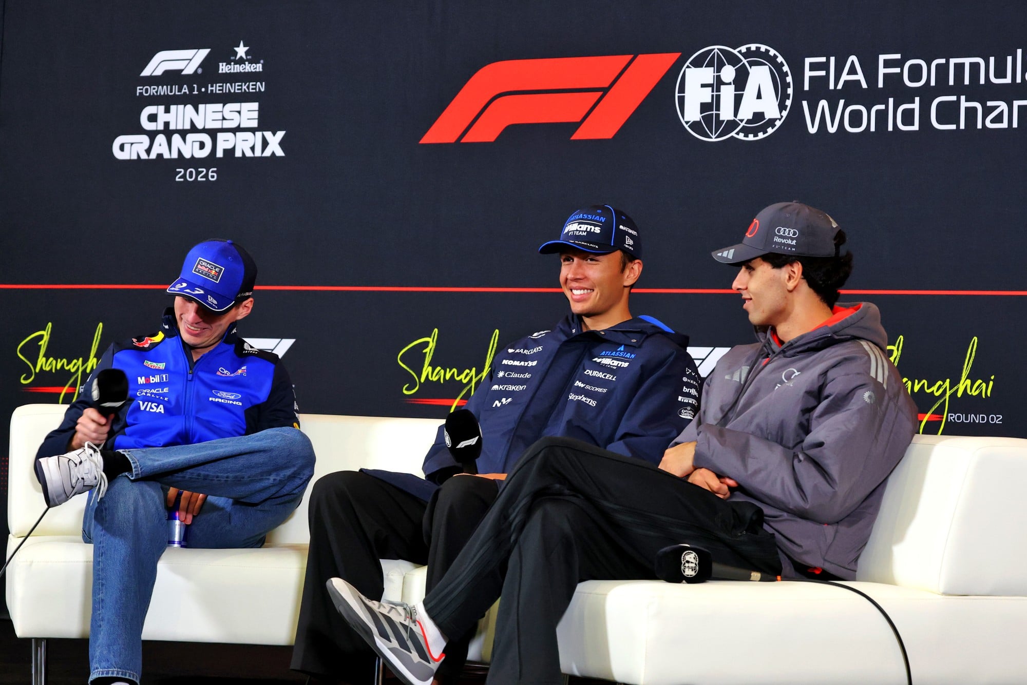 (L to R): Max Verstappen (NLD) Red Bull Racing; Alexander Albon (THA) Williams F1 Team; and Gabriel Bortoleto (BRA) Audi F1 Team, in the FIA Press Conference.