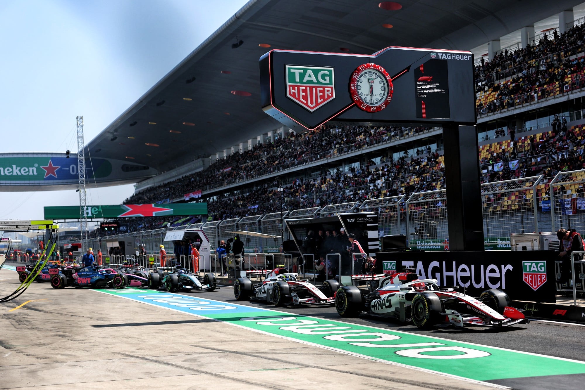 Esteban Ocon (FRA) Haas F1 Team VF-26 leaves the pits.