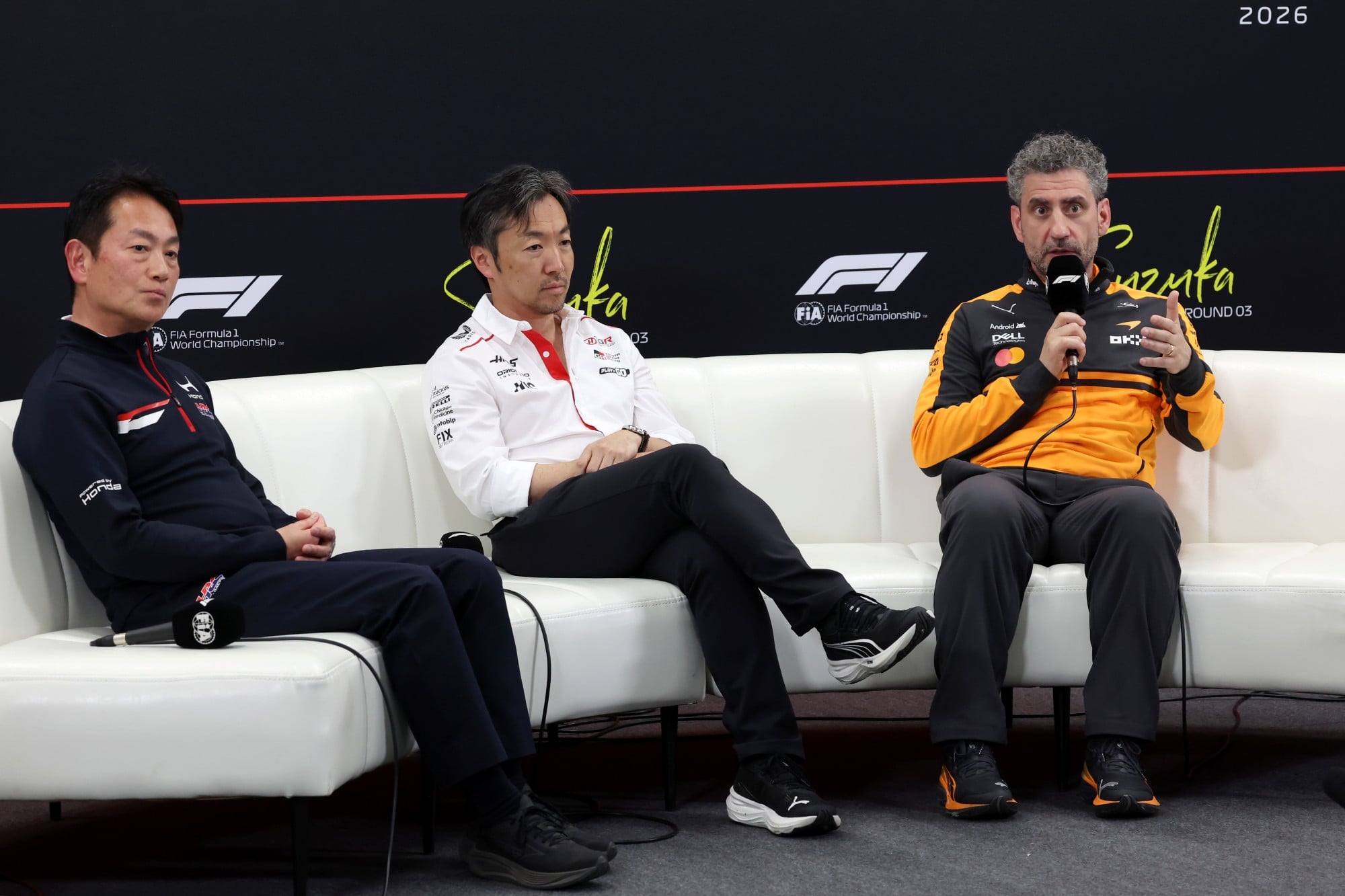 (L to R): Koji Watanabe (JPN) Honda Racing Corporation - HRC - President; Ayao Komatsu (JPN) Haas F1 Team Principal; and Andrea Stella (ITA) McLaren F1 Team Team Principal, in the FIA Press Conference.