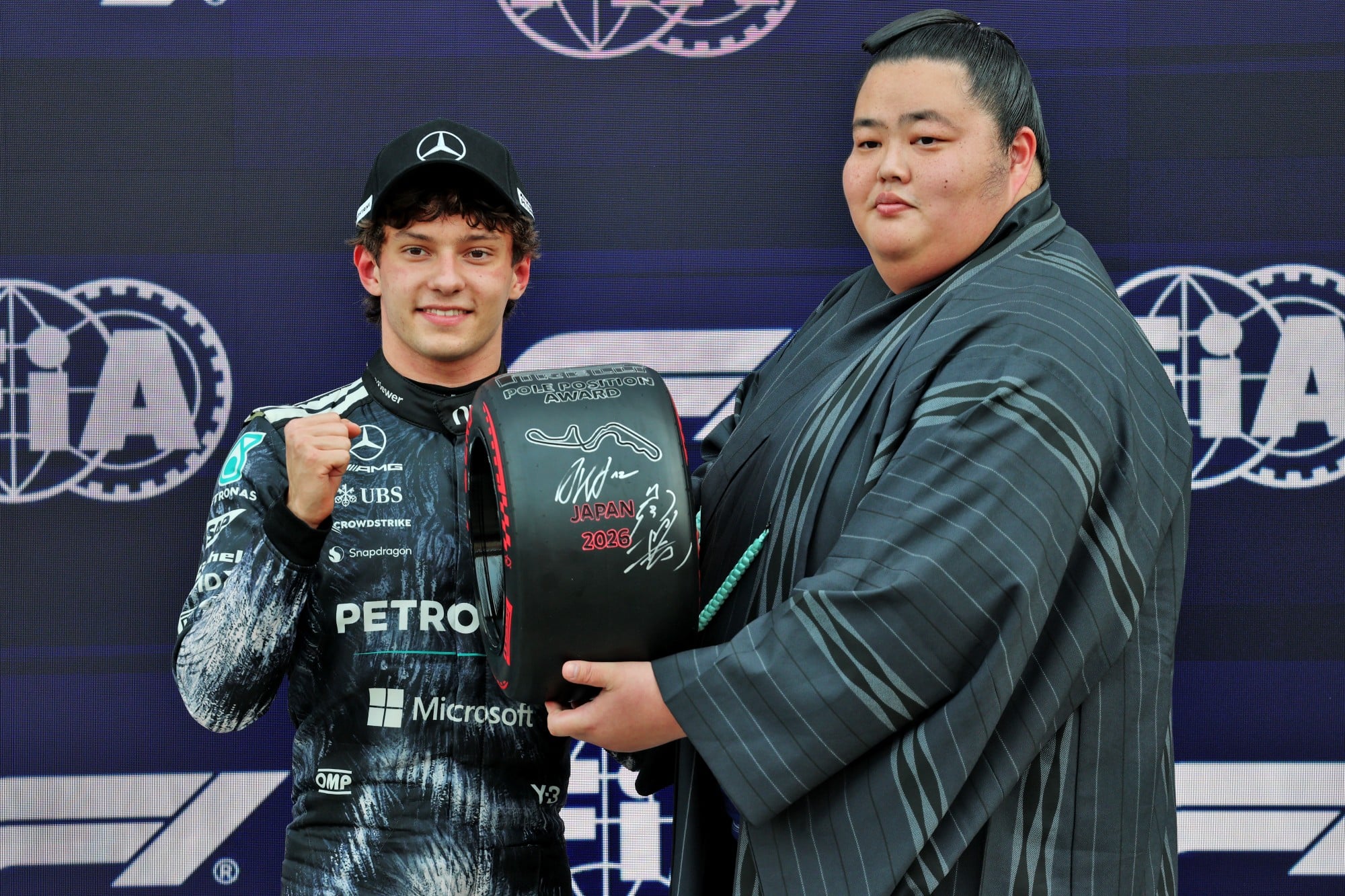 (L to R): Andrea Kimi Antonelli (ITA) Mercedes AMG Formula One Team receives the Pirelli Pole Position Award from Kotozakura Masakatsu II (JPN) Sumo Wrestler, in qualifying parc ferme.
