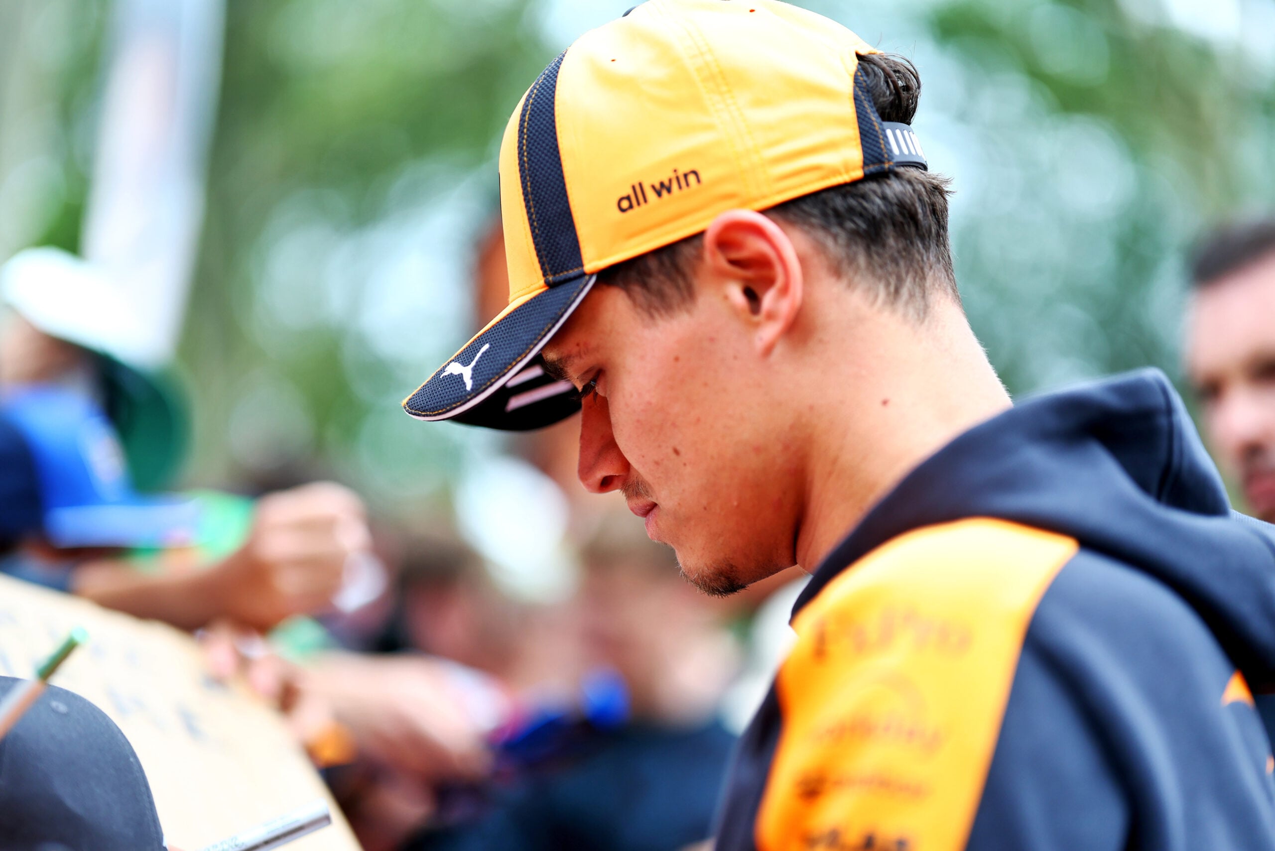Lando Norris (GBR) McLaren F1 Team with fans.
