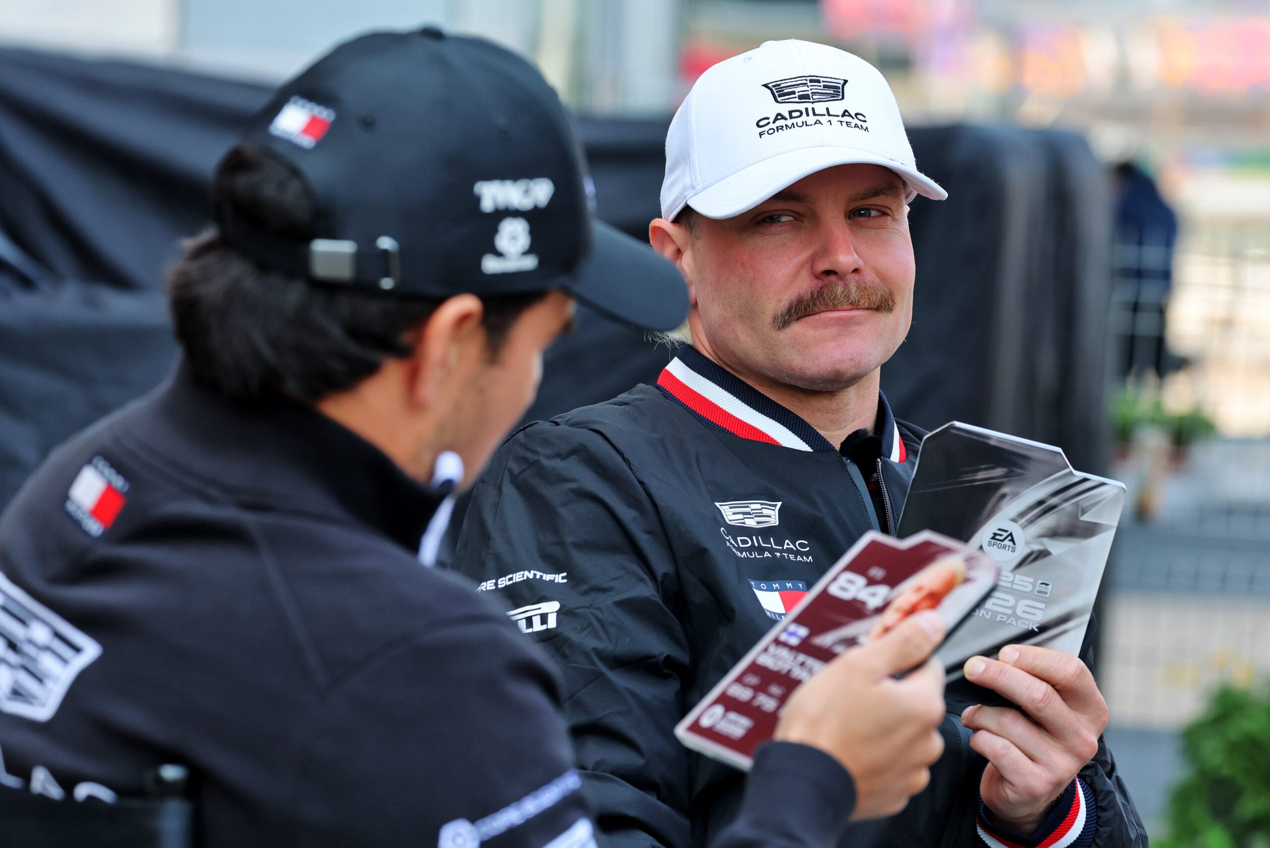 Valtteri Bottas (FIN) Cadillac Formula 1 Team with team mate Sergio Perez (MEX) Cadillac Formula 1 Team.