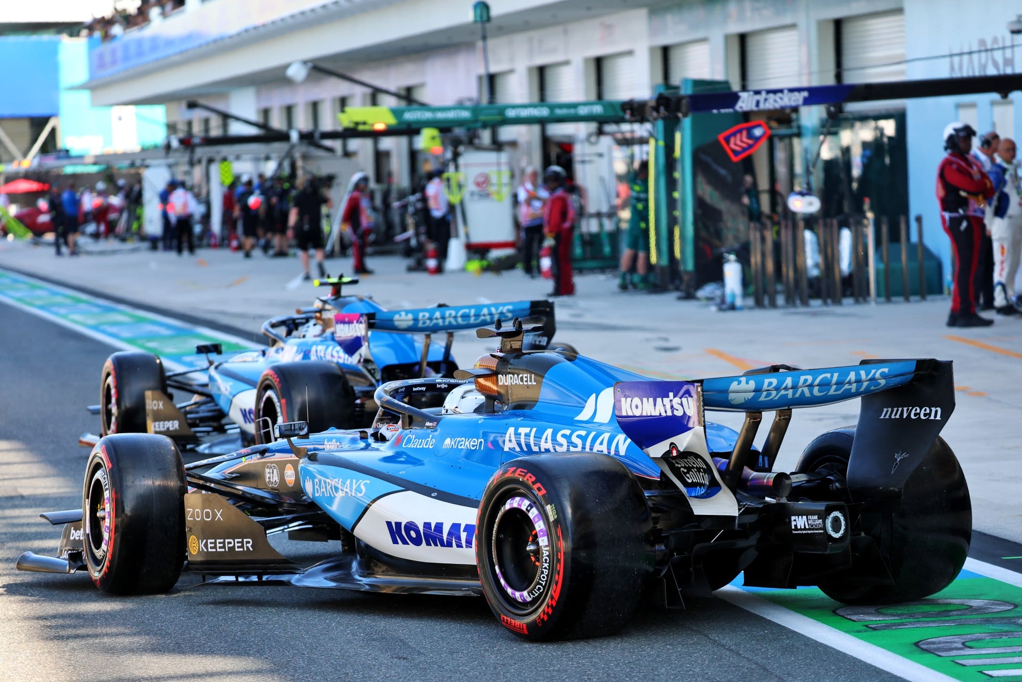 Alexander Albon (THA) Williams F1 Team FW48 and Carlos Sainz (ESP) Williams F1 Team FW48 leave the pits.