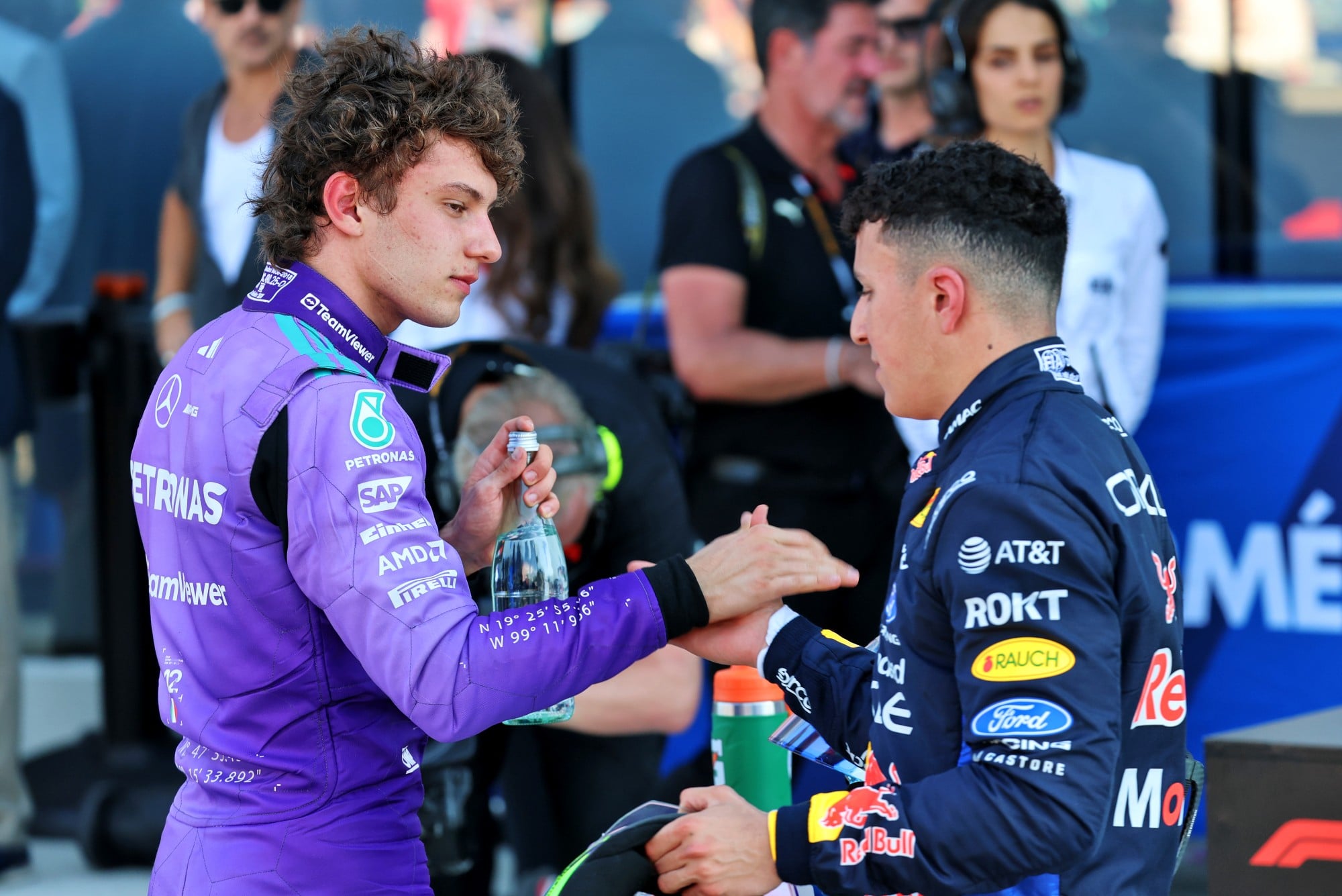 (L to R): Andrea Kimi Antonelli (ITA) Mercedes AMG Formula One Team celebrates his pole position in qualifying parc ferme with Isack Hadjar (FRA) Red Bull Racing.