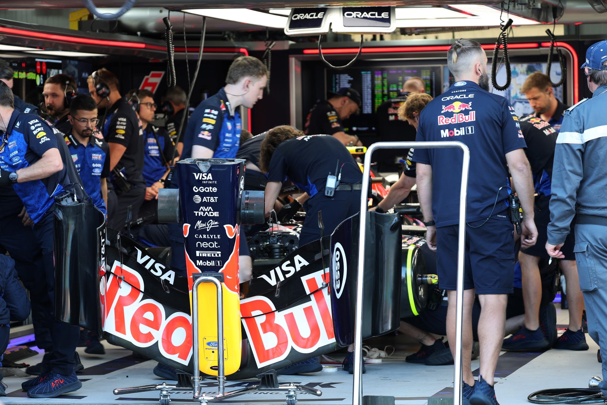 Red Bull Racing mechanics work on Isack Hadjar's (FRA) Red Bull Racing RB22.
