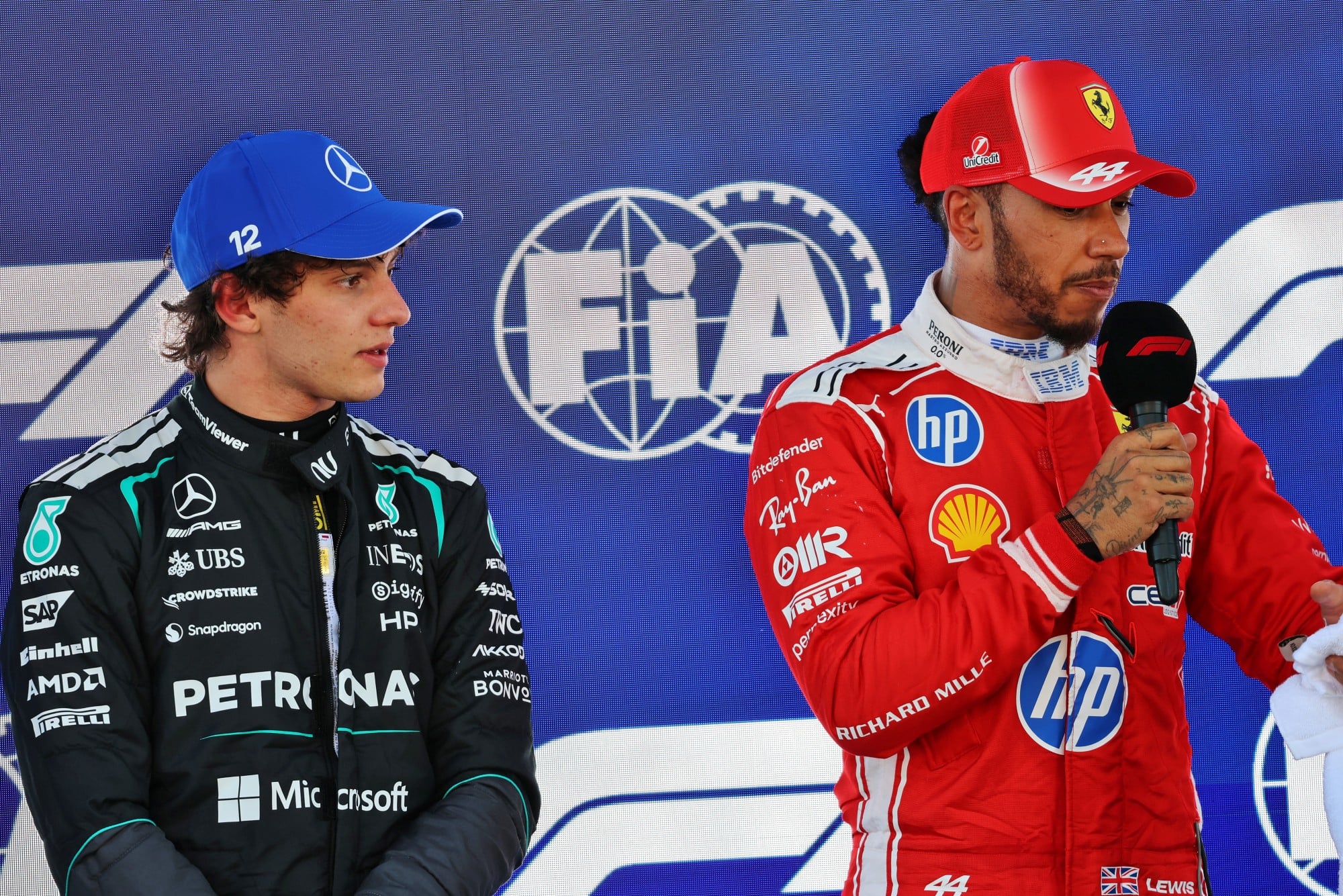 (L to R): Andrea Kimi Antonelli (ITA) Mercedes AMG Formula One Team in qualifying parc ferme with Lewis Hamilton (GBR) Scuderia Ferrari.