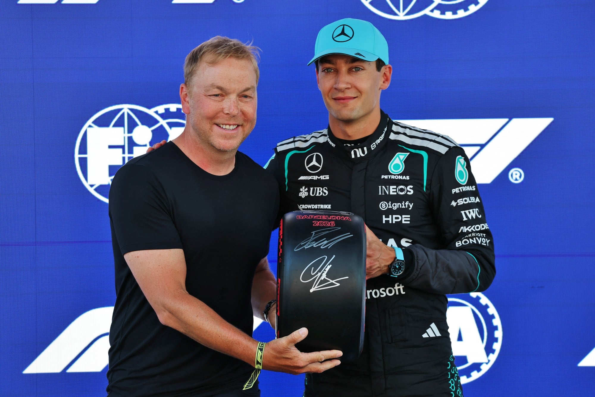(L to R): Sir Chris Hoy (GBR) presents the Pirelli Pole Position Award to George Russell (GBR) Mercedes AMG Formula One Team in qualifying parc ferme.