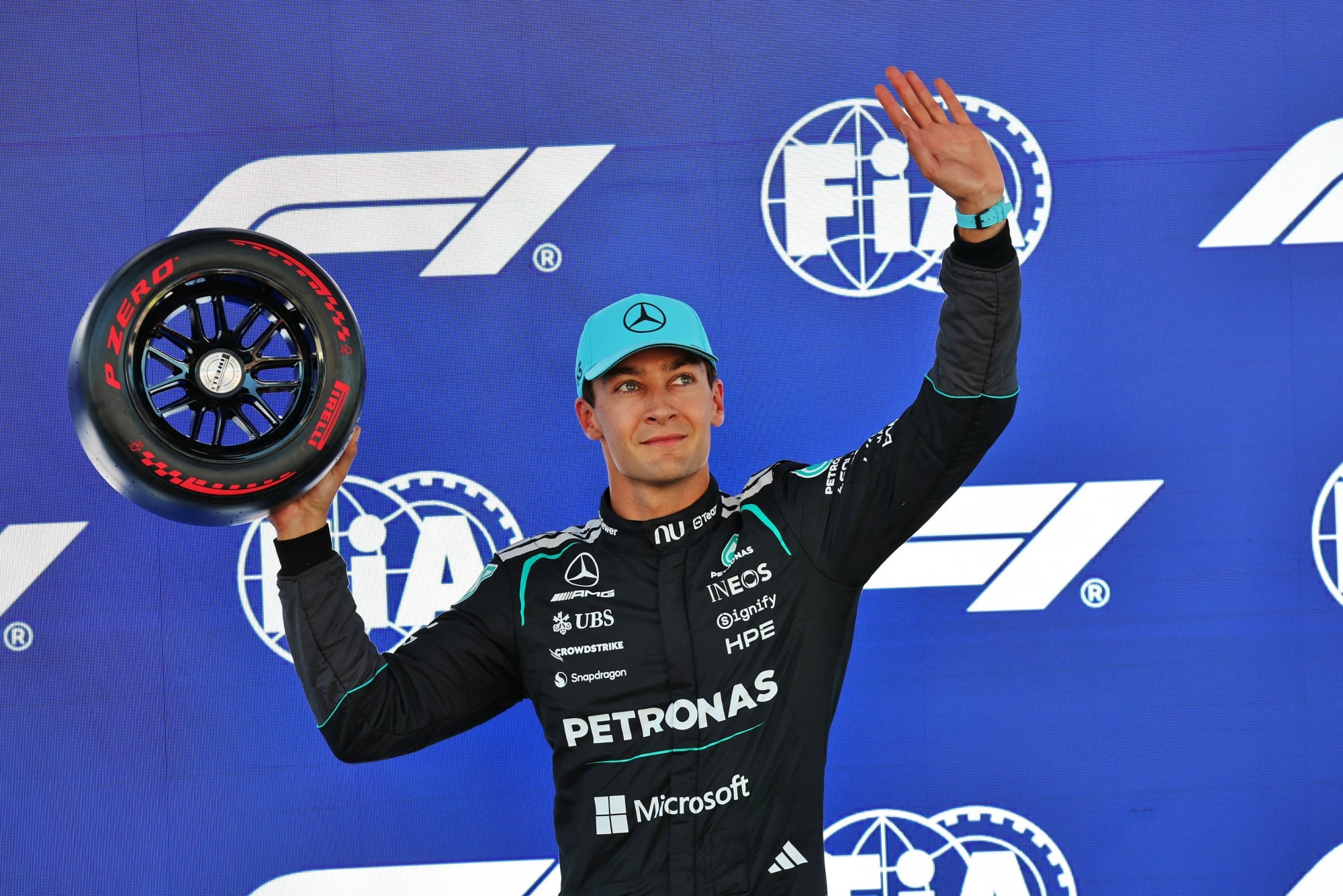 George Russell (GBR) Mercedes AMG Formula One Team in celebrates in qualifying parc ferme with the Pirelli Pole Position Award.