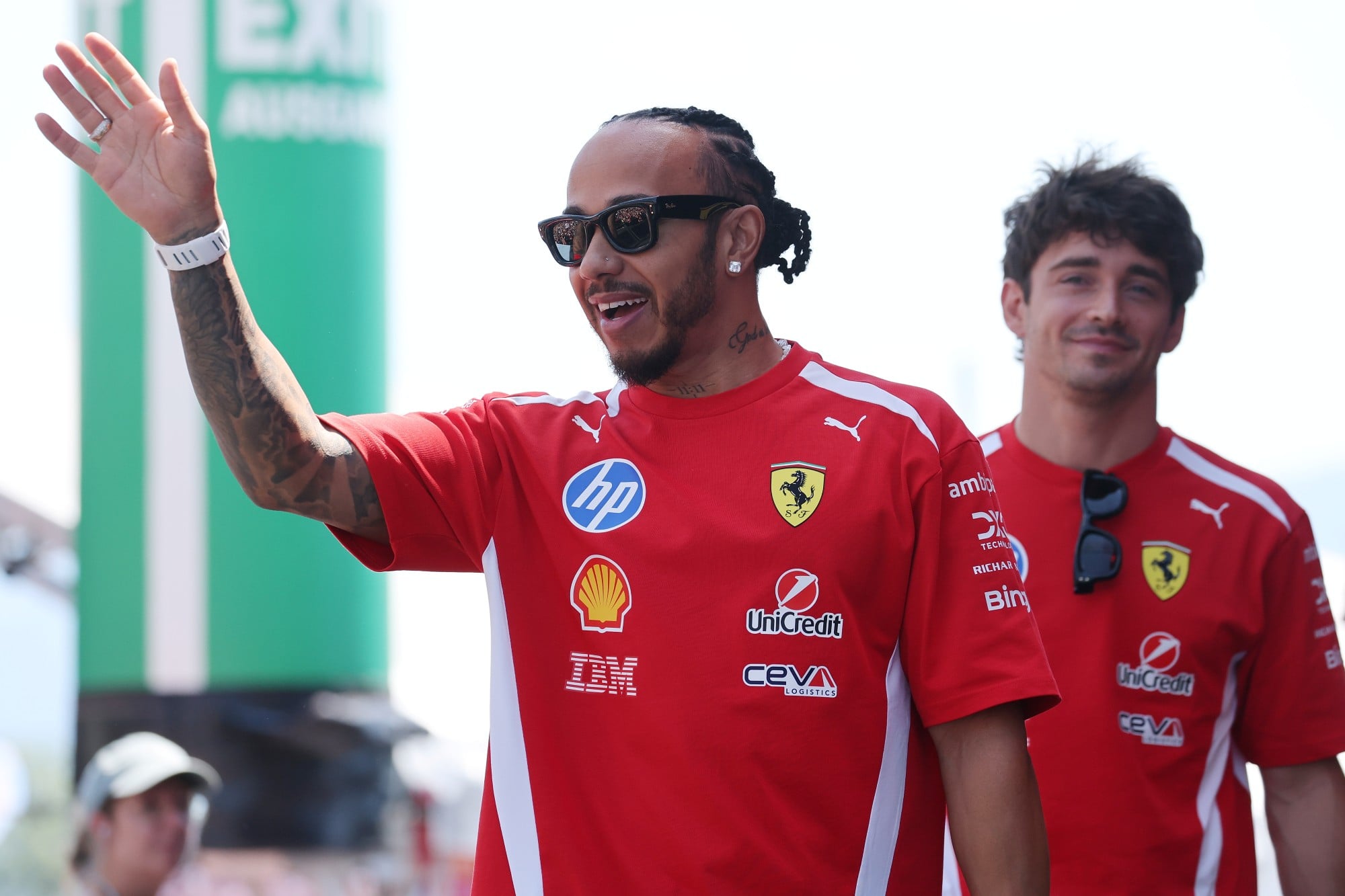 Lewis Hamilton (GBR) Scuderia Ferrari and Charles Leclerc (MON) Scuderia Ferrari on the FanZone Stage.