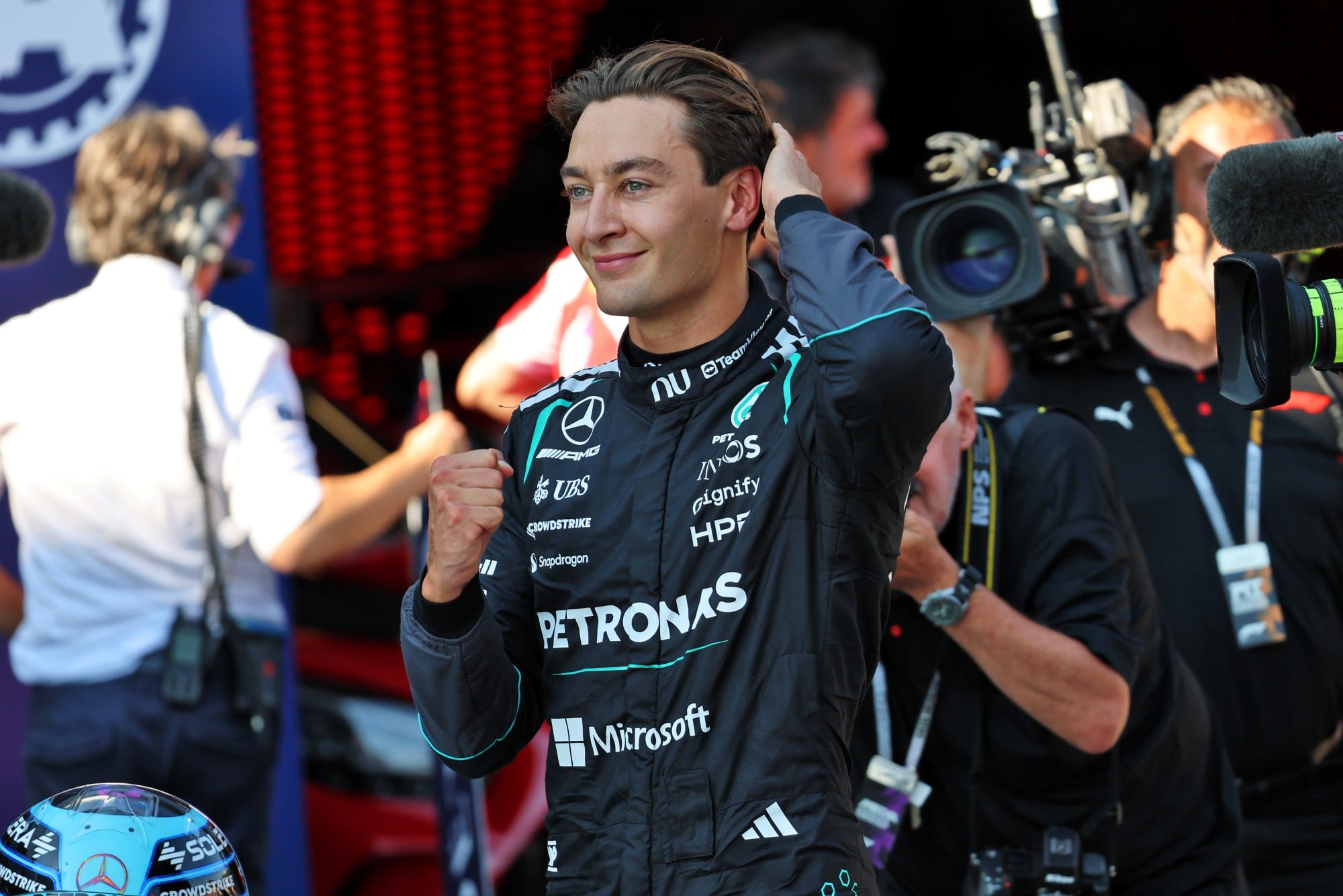 George Russell (GBR) Mercedes AMG Formula One Team celebrates pole position in qualifying parc ferme.