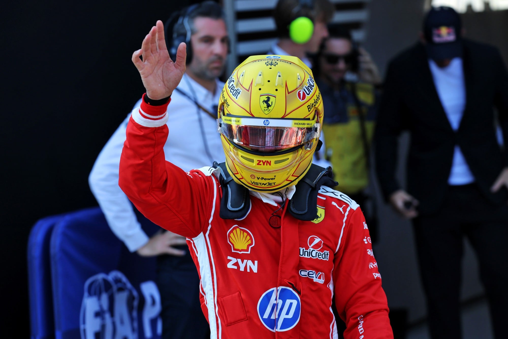 Lewis Hamilton (GBR) Scuderia Ferrari celebrates in qualifying parc ferme.