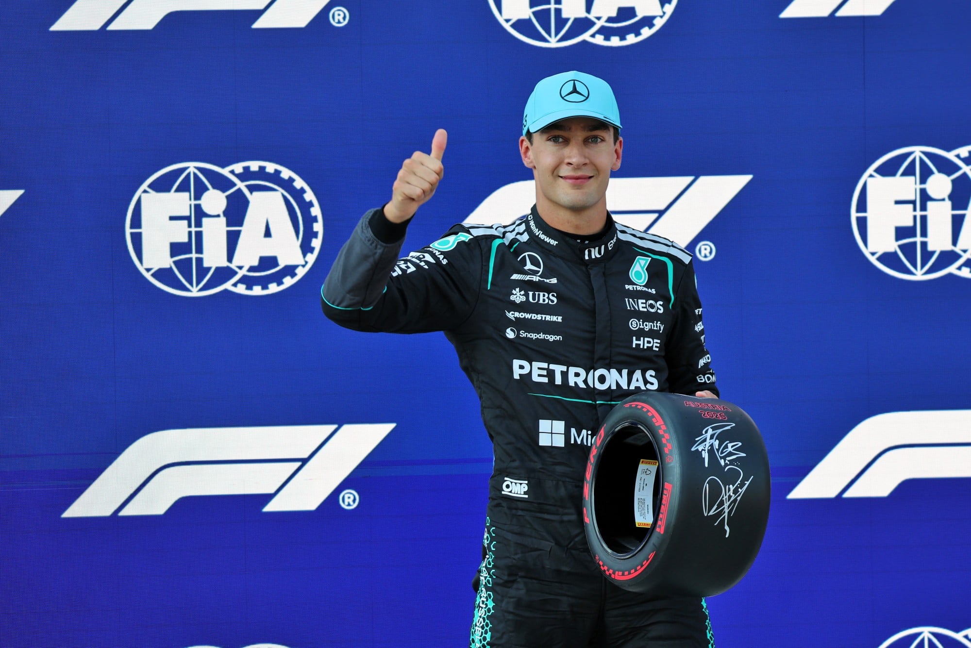 George Russell (GBR) Mercedes AMG Formula One Team with the Pirelli Pole Position Award in qualifying parc ferme.