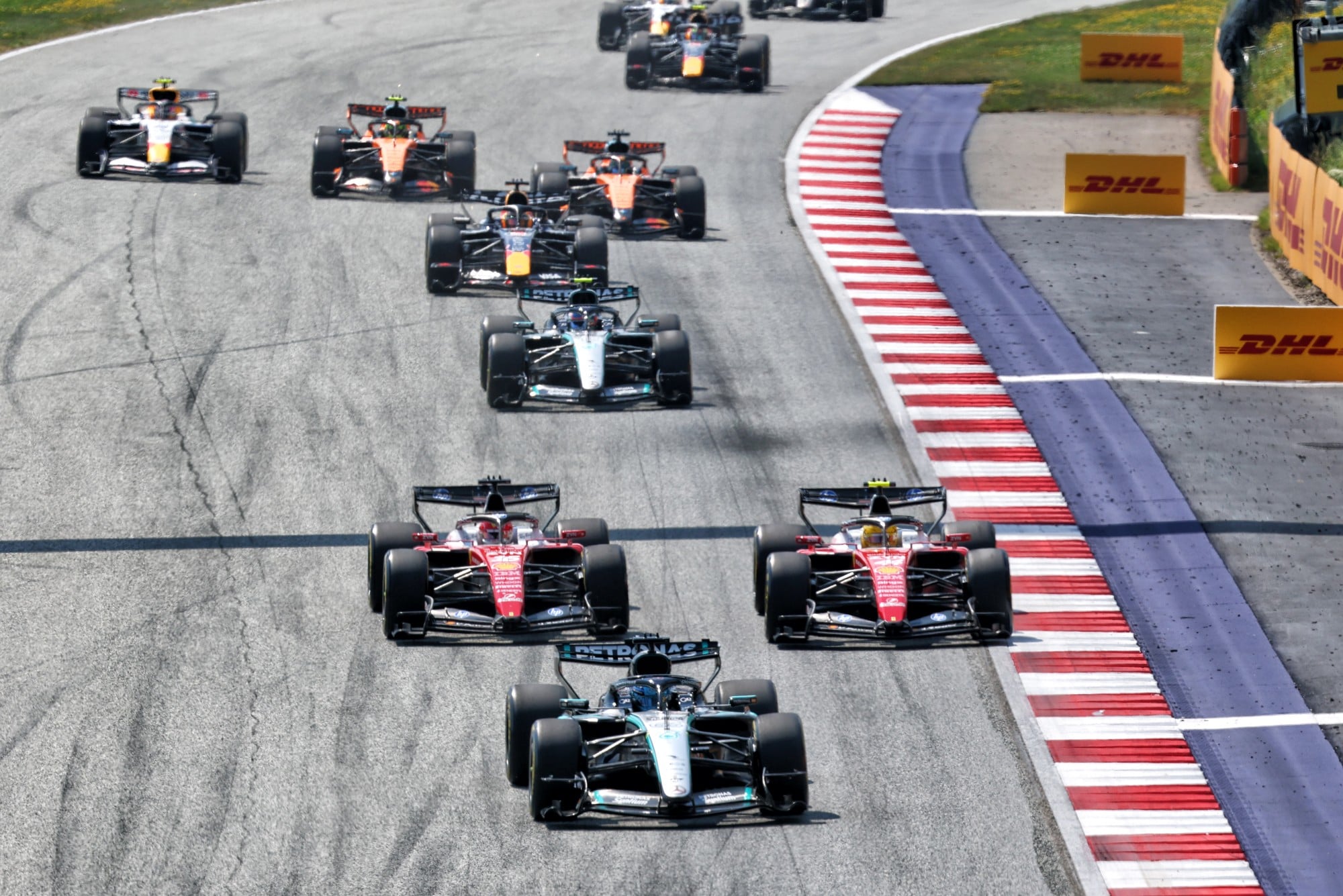 George Russell (GBR) Mercedes AMG Formula One Team W17 leads at the start of the race.