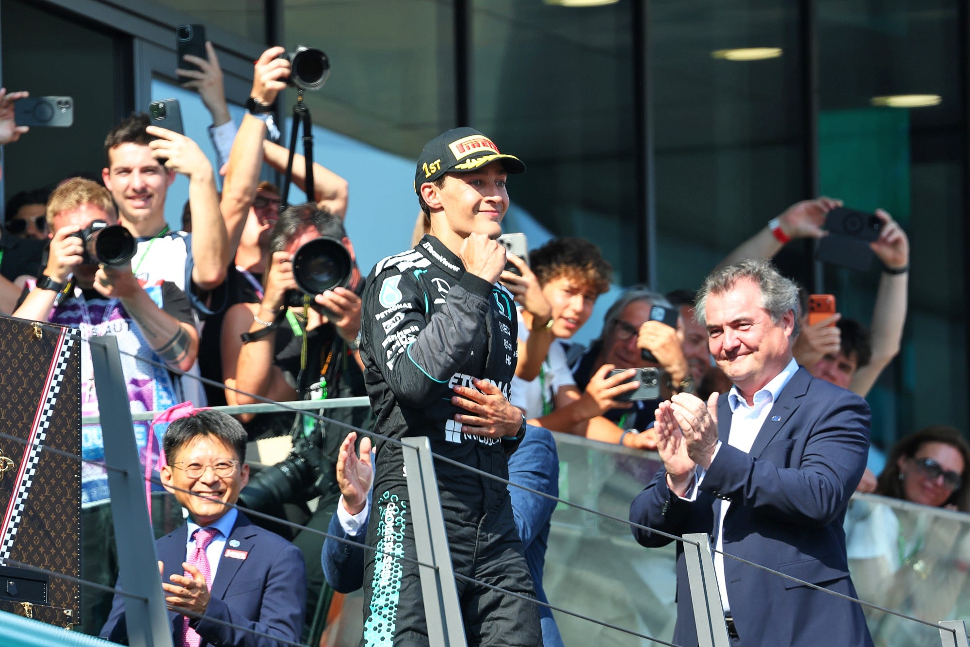 Race winner George Russell (GBR) Mercedes AMG Formula One Team celebrates on the podium.