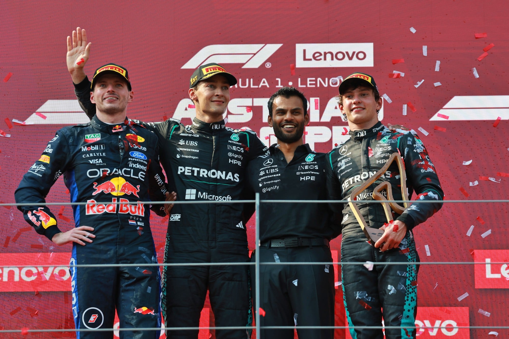 The podium (L to R): Max Verstappen (NLD) Red Bull Racing, second; George Russell (GBR) Mercedes AMG Formula One Team, race winner; Arun Rajkumar (GBR) Trackside Powerunit Engineer; Andrea Kimi Antonelli (ITA) Mercedes AMG Formula One Team, third.