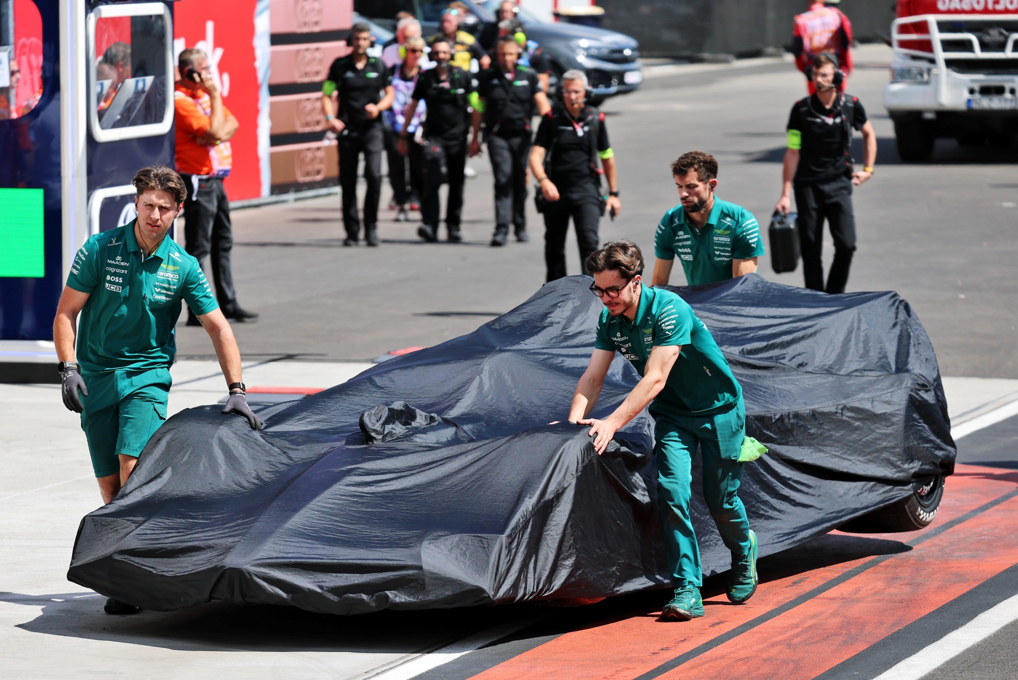 The Aston Martin F1 Team AMR26 of Lance Stroll (CDN) is recovered back to the pits at the end of first practice session.