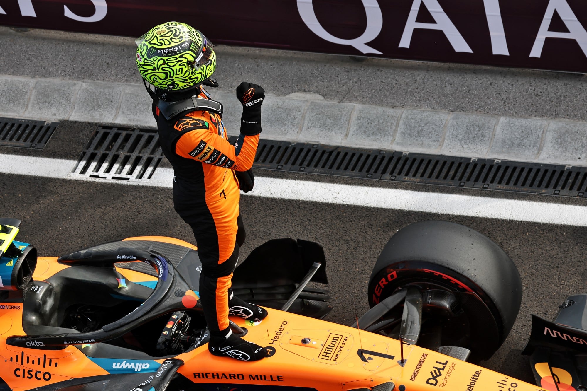 Lando Norris (GBR) McLaren F1 Team MCL40 celebrates his pole position in qualifying parc ferme.