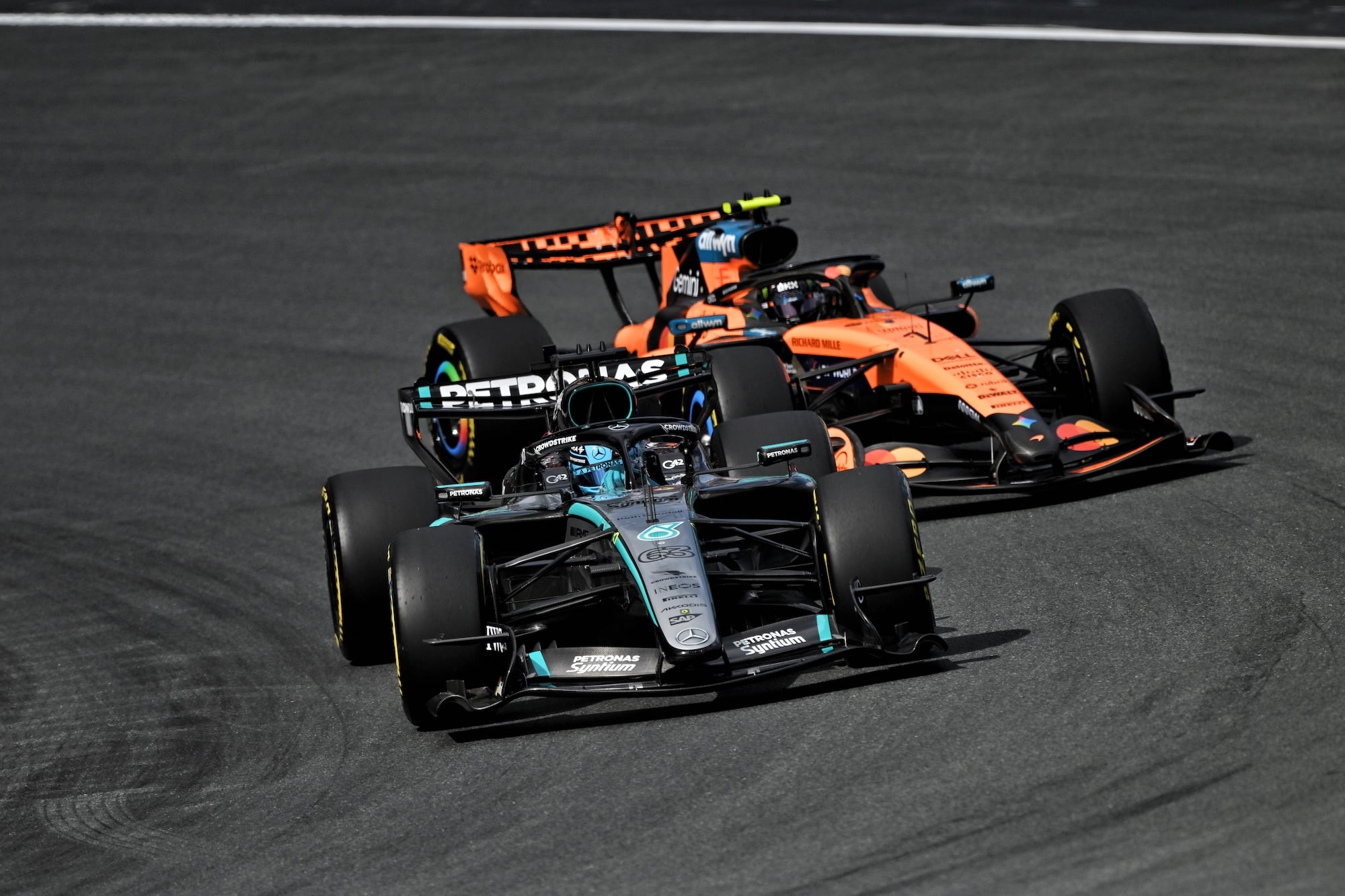 George Russell (GBR) Mercedes AMG Formula One Team W17 leads at the start of the race.