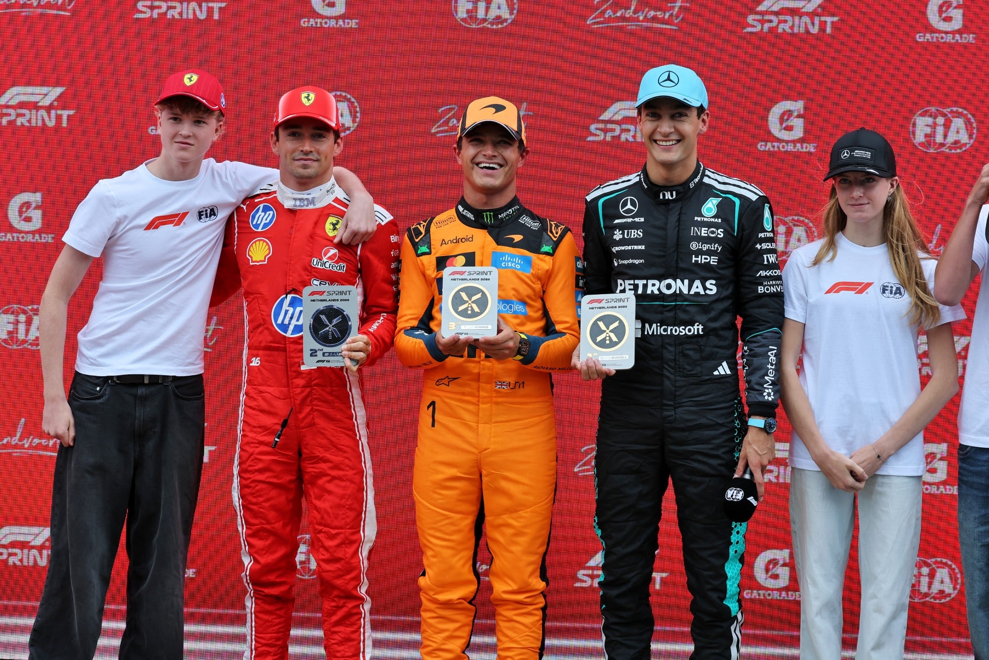 Sprint race top three in parc ferme (L to R): Charles Leclerc (MON) Scuderia Ferrari, second; Lando Norris (GBR) McLaren F1 Team, third; George Russell (GBR) Mercedes AMG Formula One Team, race winner.